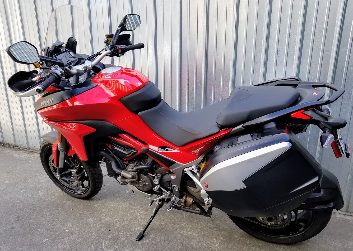 Italian performance meets everyday versatility. This 2013 Ducati