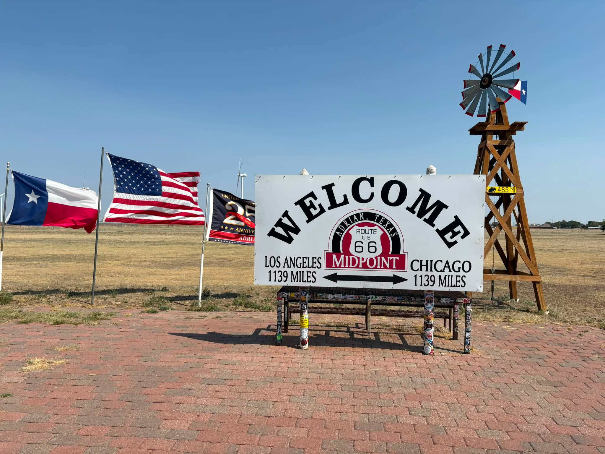 Route 66 road trip: Midpoint Sign, vintage cars, and Blue Hole