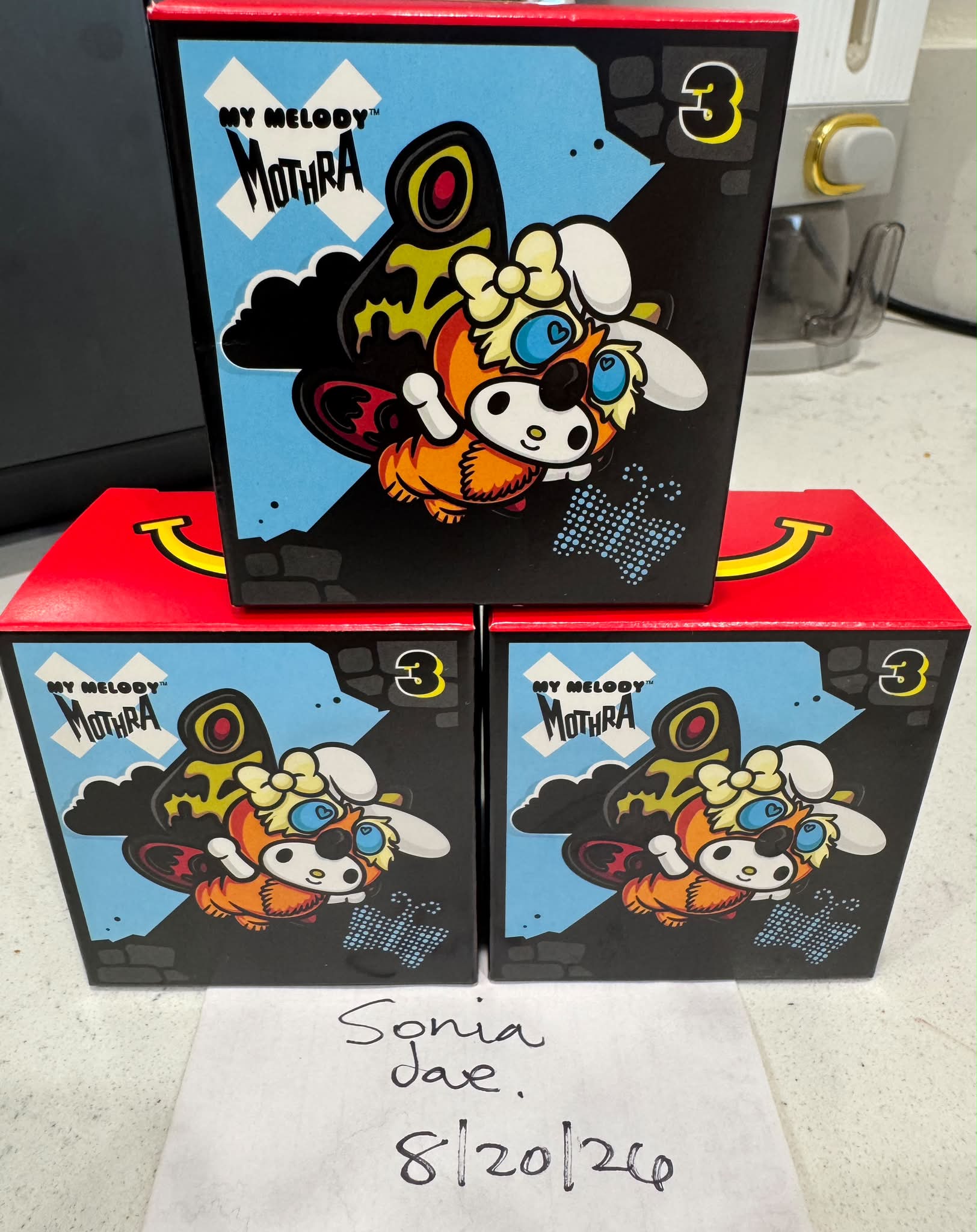 Trading Chococat Mecha Godzilla for Pompompurin Gigan McDonald's toy