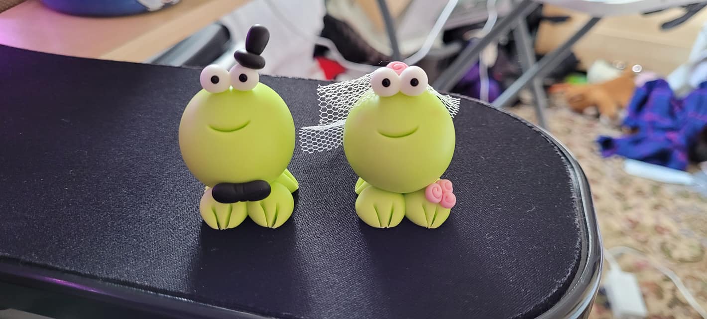 What is the story behind the quirky frog wedding gift?