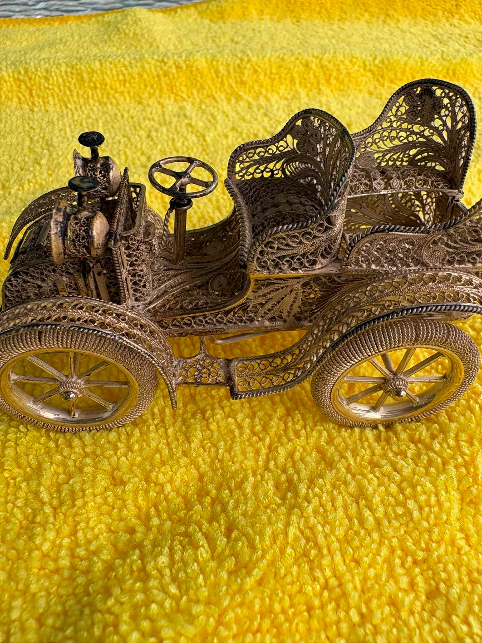 Identifying silver or silver-plated decorative car figurine