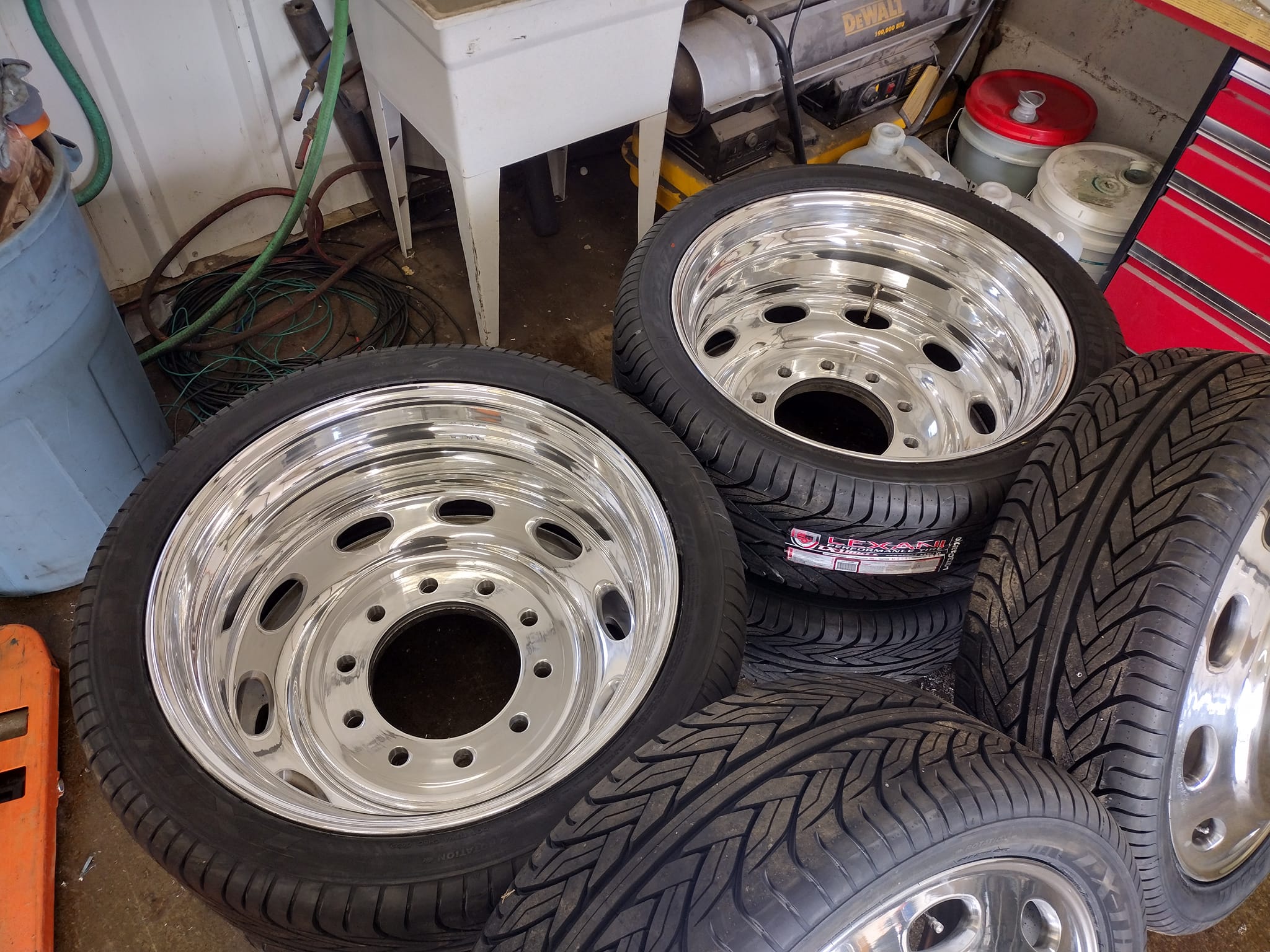 24s, Pete wheels, 305-35-24 tires, center caps an lug covers 