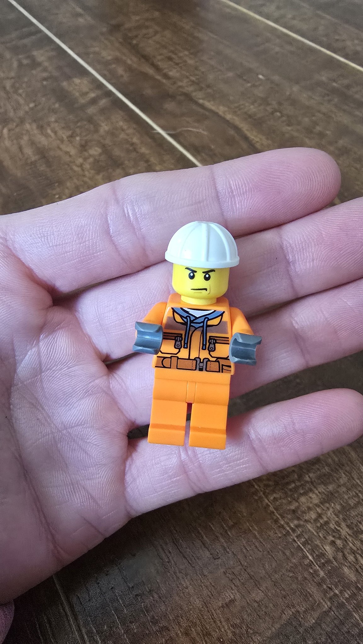 Lego figure resembles Machine Gun Kelly in orange jumpsuit