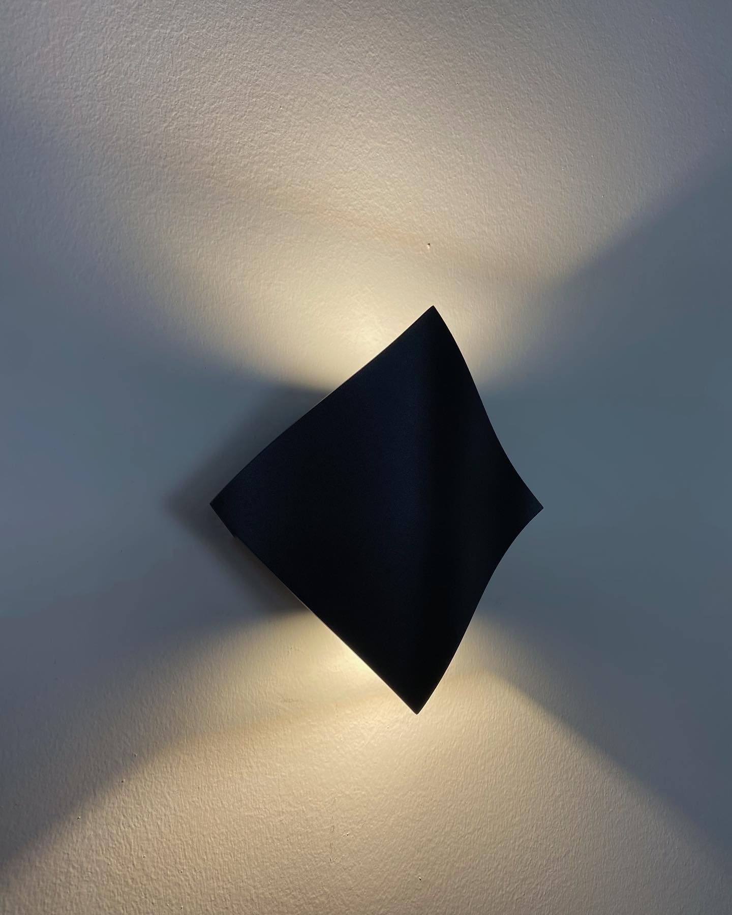 ECD Lighting - The soft curve in this diamond fixture adds...