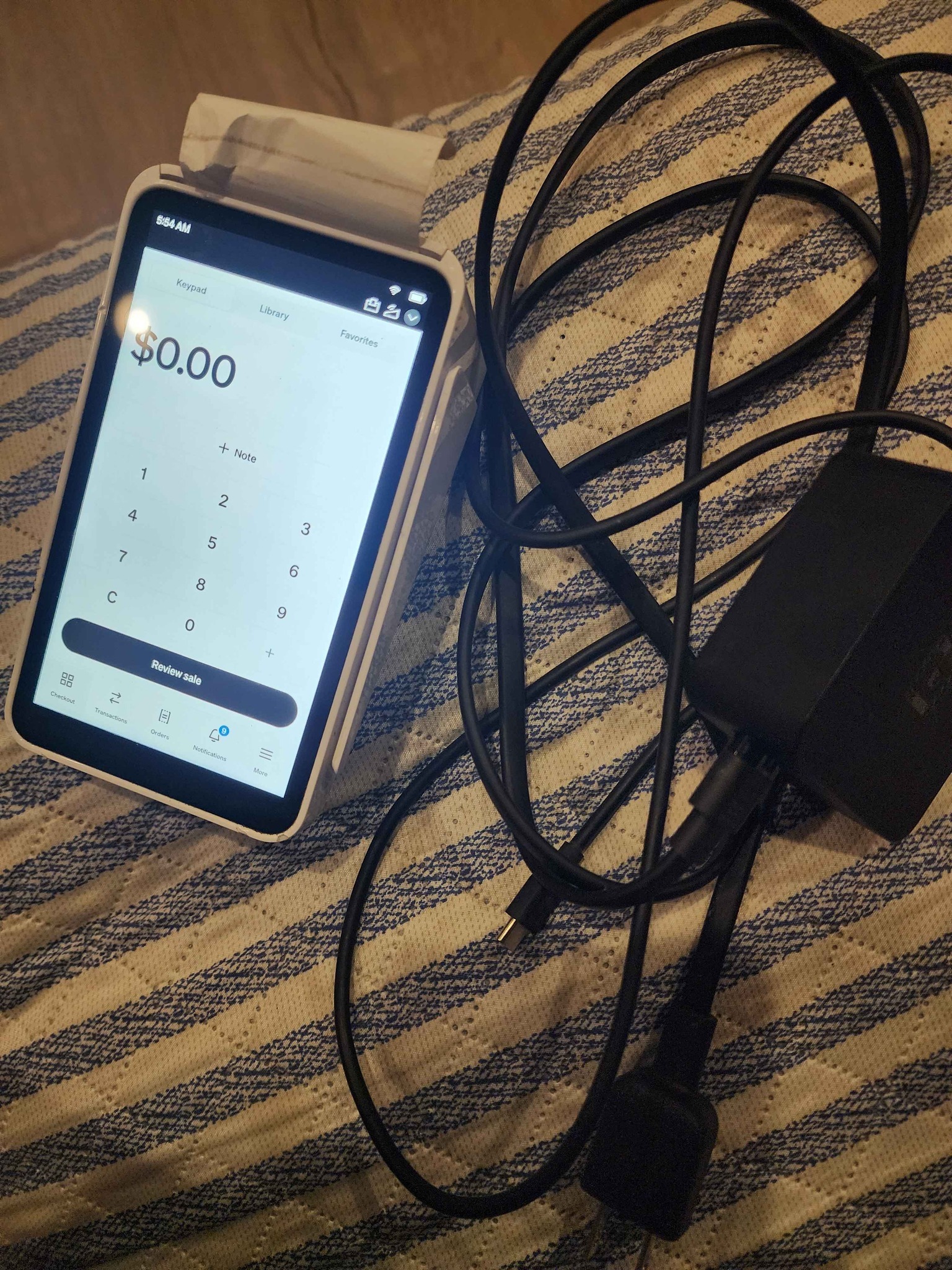 Used - Square posterminal model# 0120. Comes with charger