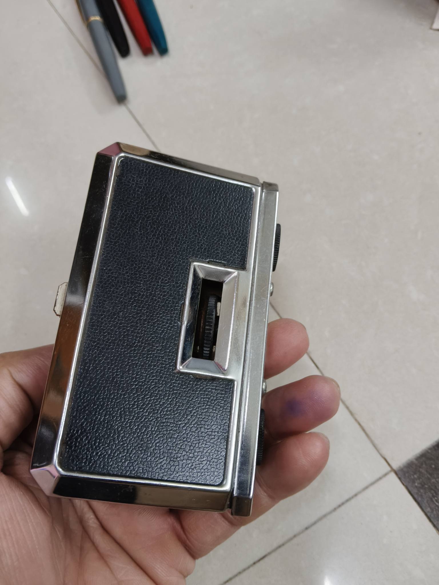 An old collectible vintage folding pocket Binocular, MADE IN JAPAN