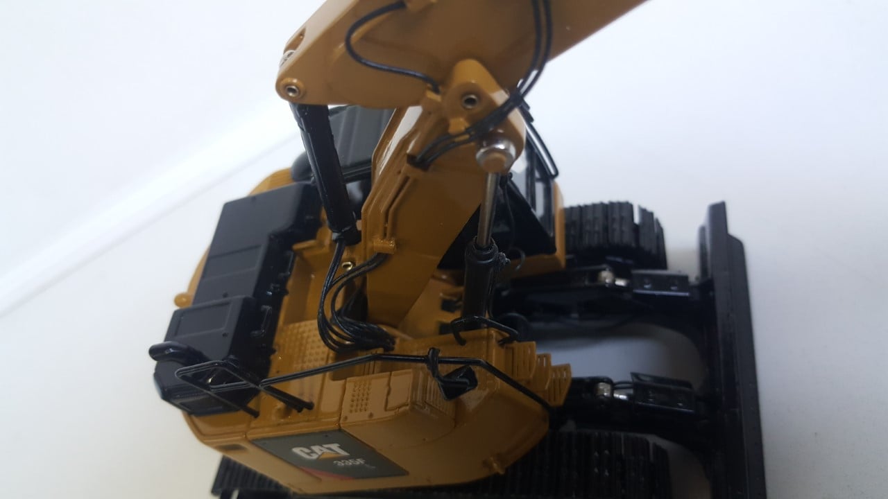 Cat 335F with triple-boom and hydraulic breaker. DCM 1/50