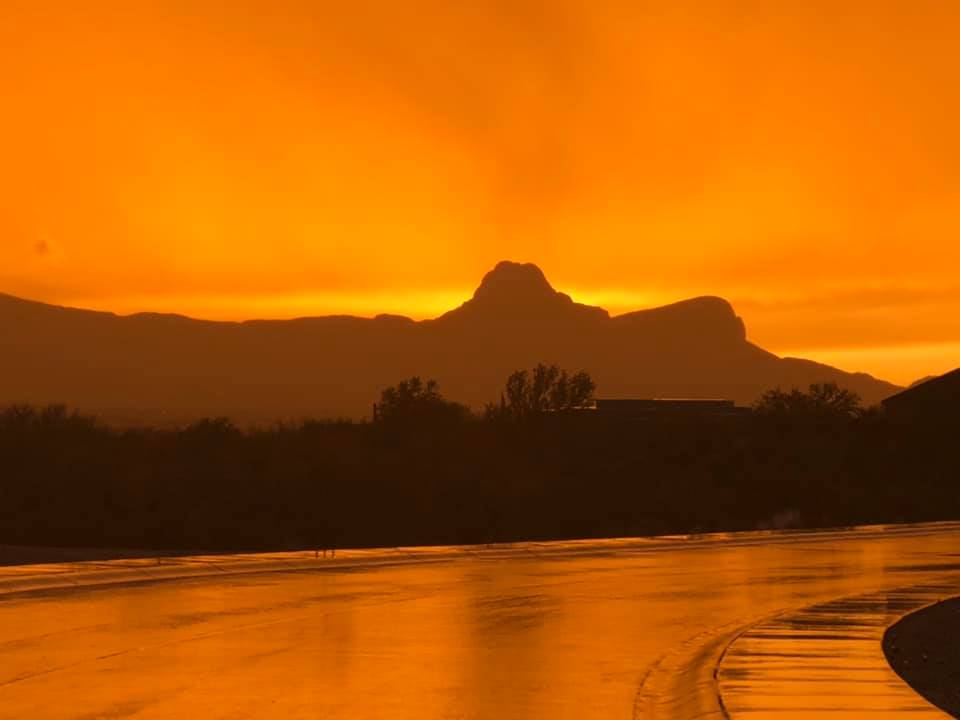 Just a little rain as the sun goes down. Avra Valley, Arizona USA