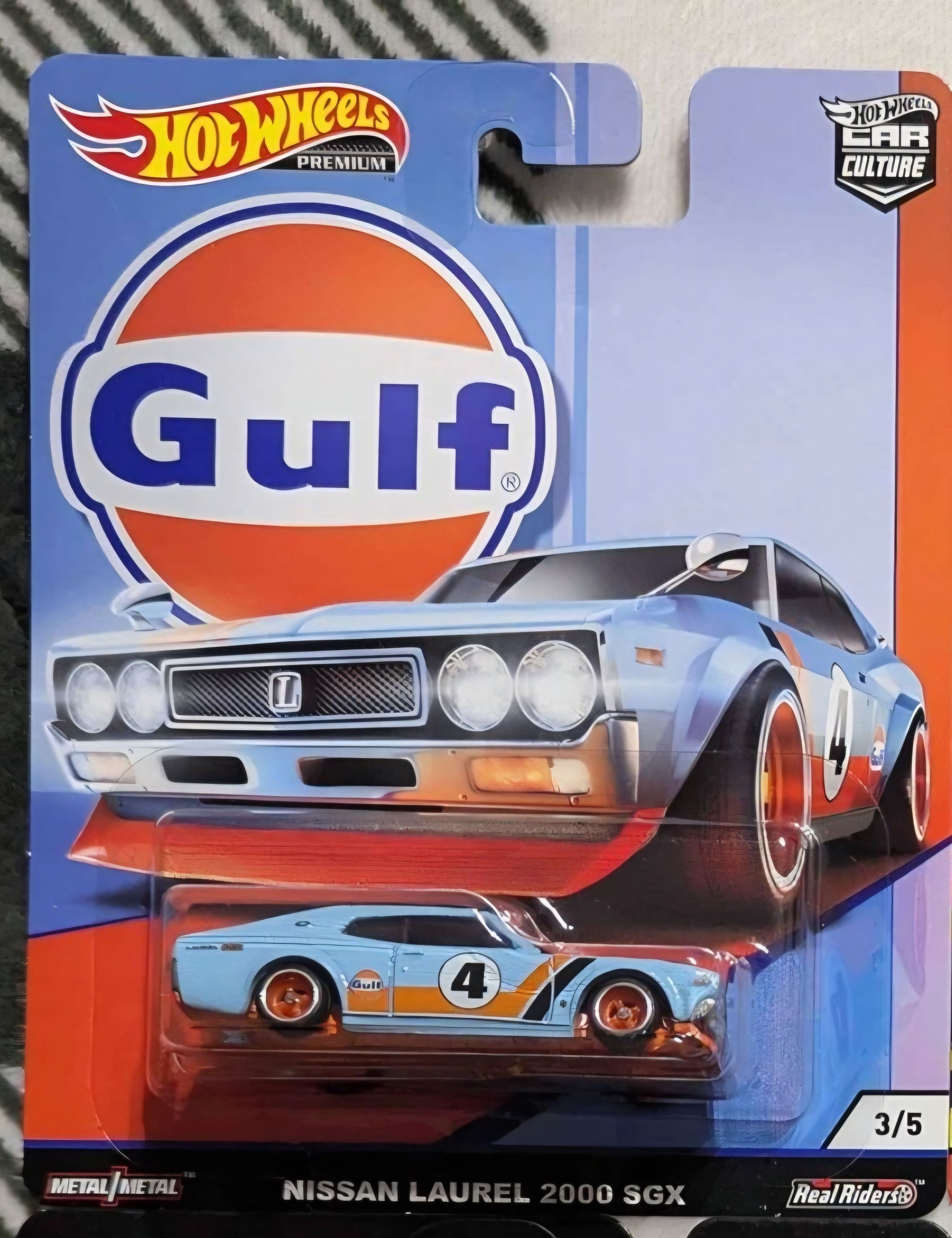 Gulf-themed Nissan Laurel 2000 SGX Hot Wheels die-cast model