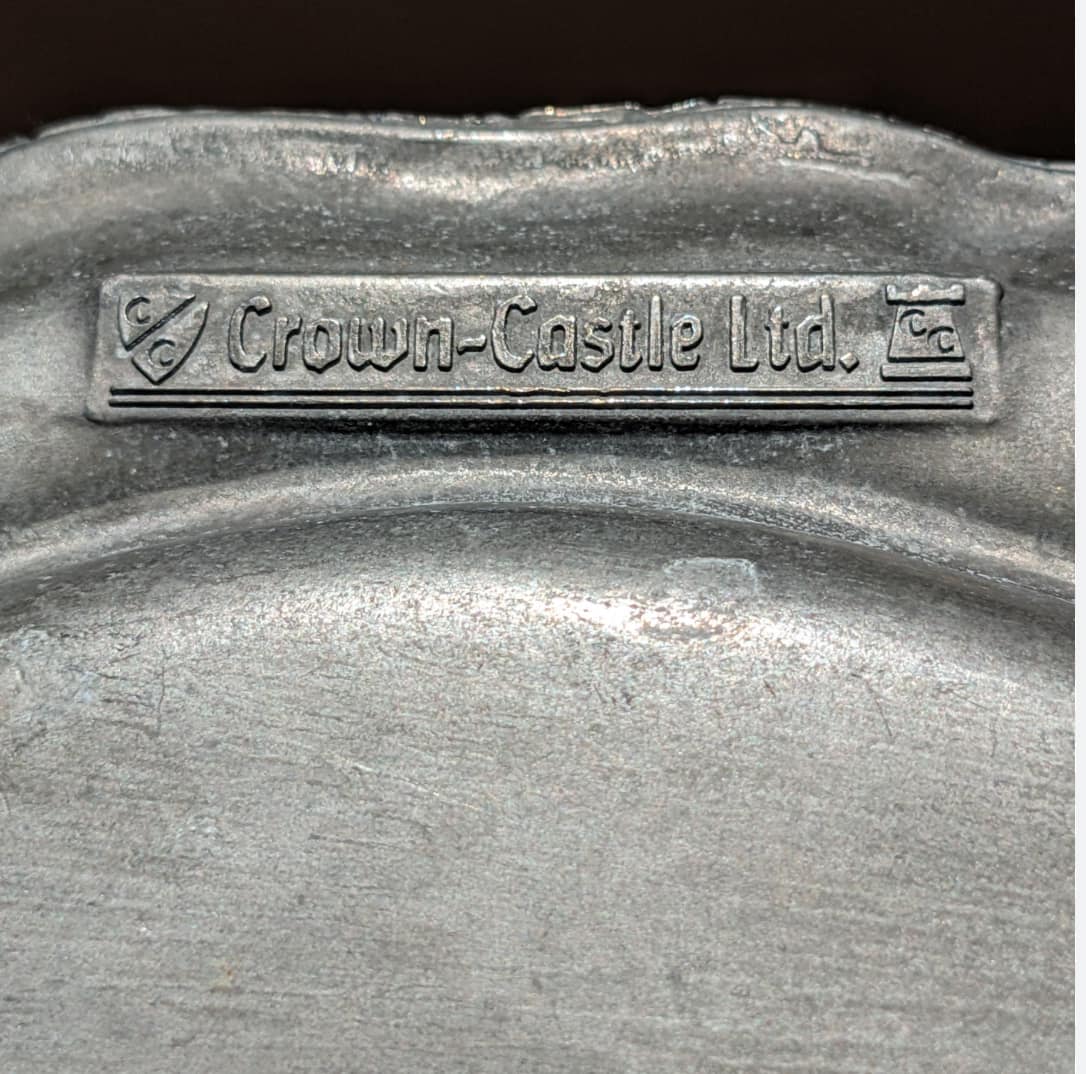Are plates from Crown Castle Ltd real pewter or an aluminum zinc