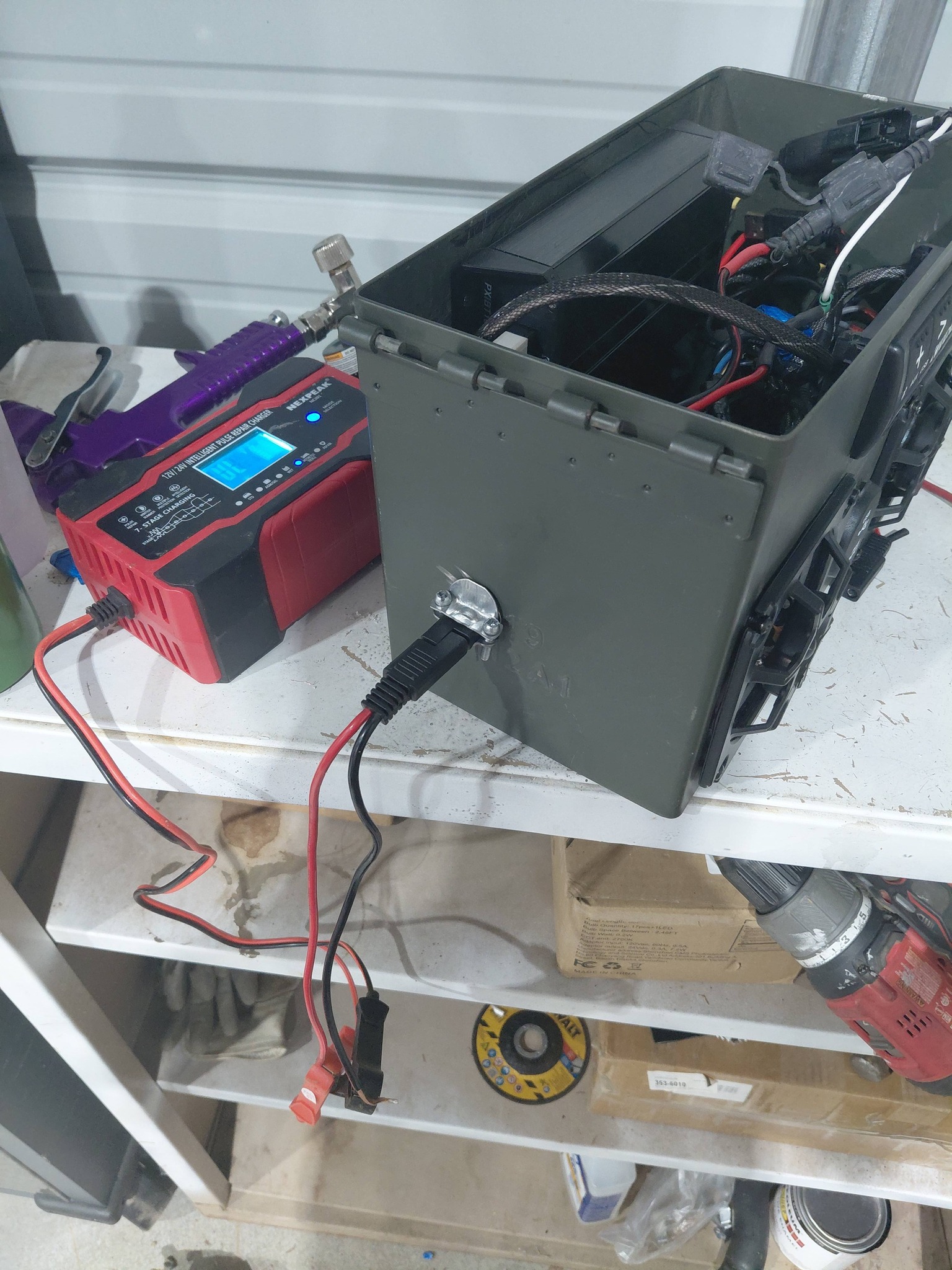 What compact battery and charging system for Multipro tailgate