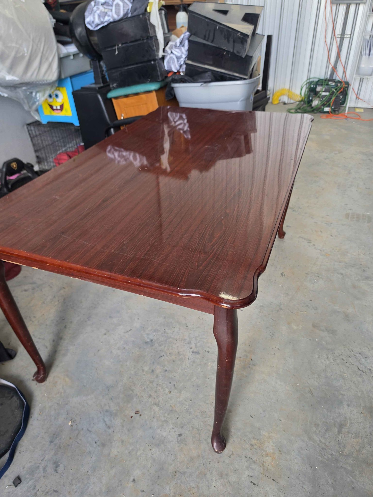 Nice cherrywood finish dining table. Very sturdy, has some