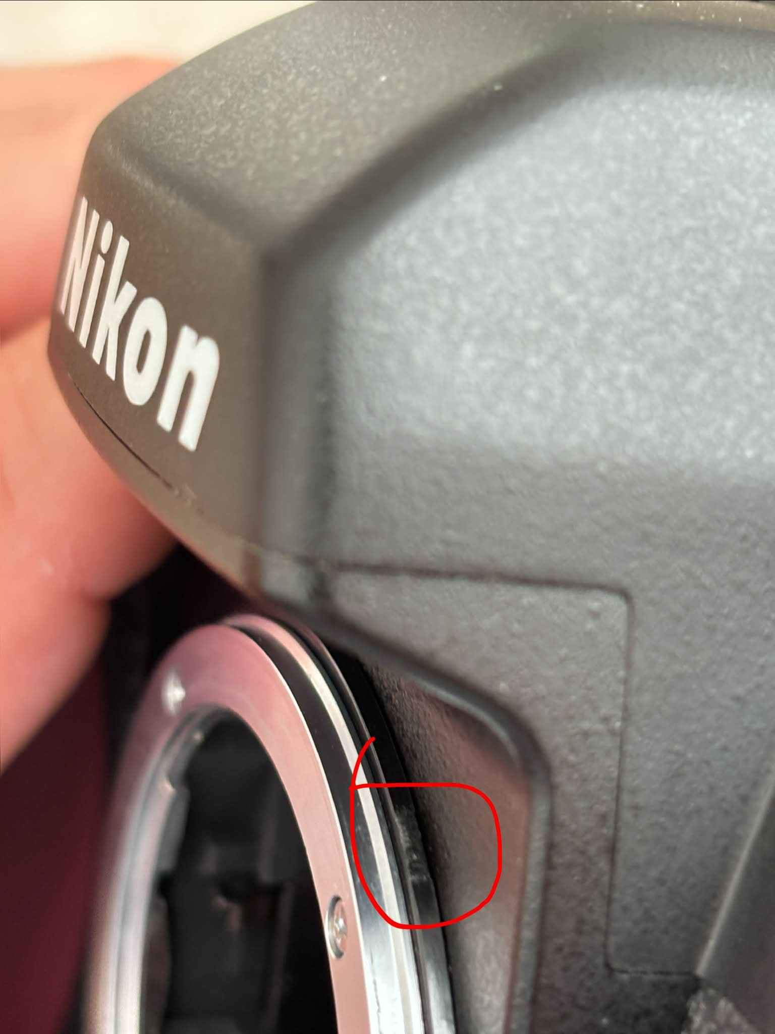 What are workarounds for a broken AI coupling lever on a Nikon F100?