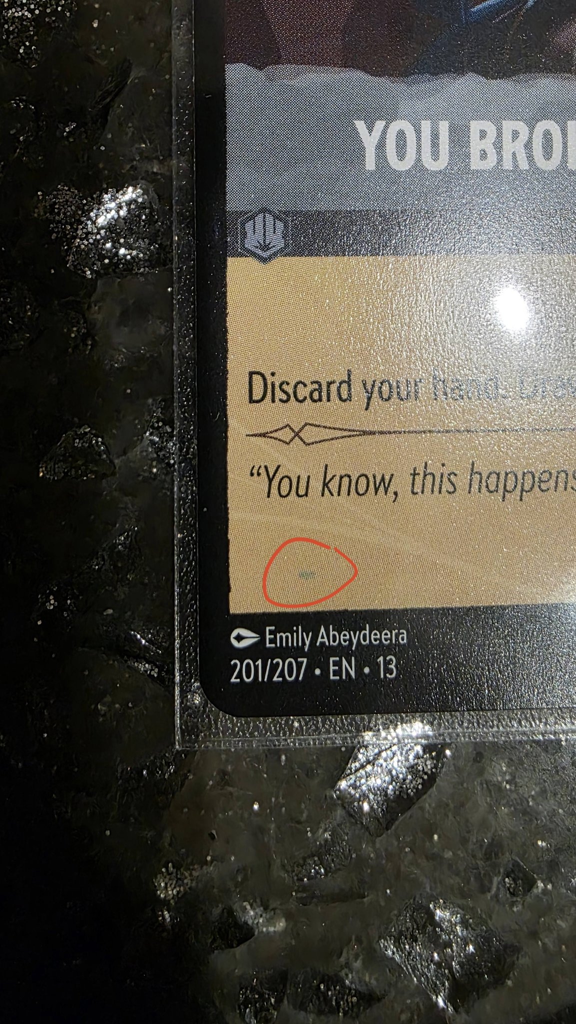 What are these marks on Disney Lorcana cards?