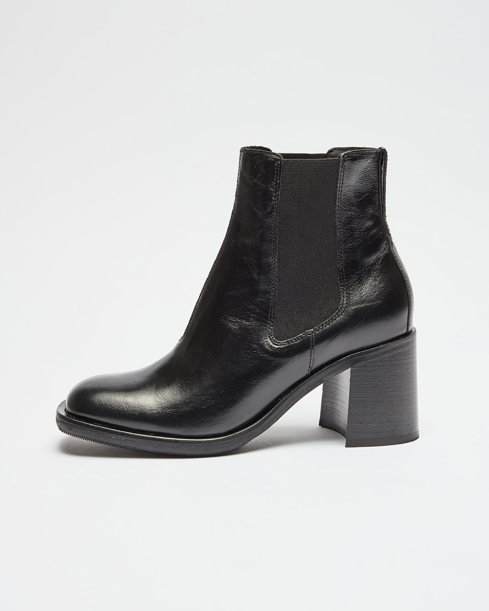Our Low Shaft Boot in Black. This low ankle boot has a squared toe 
