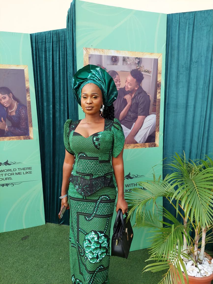 Nigerian Fashion Designer Janet Omojuwa's Handmade Green Dress Creation