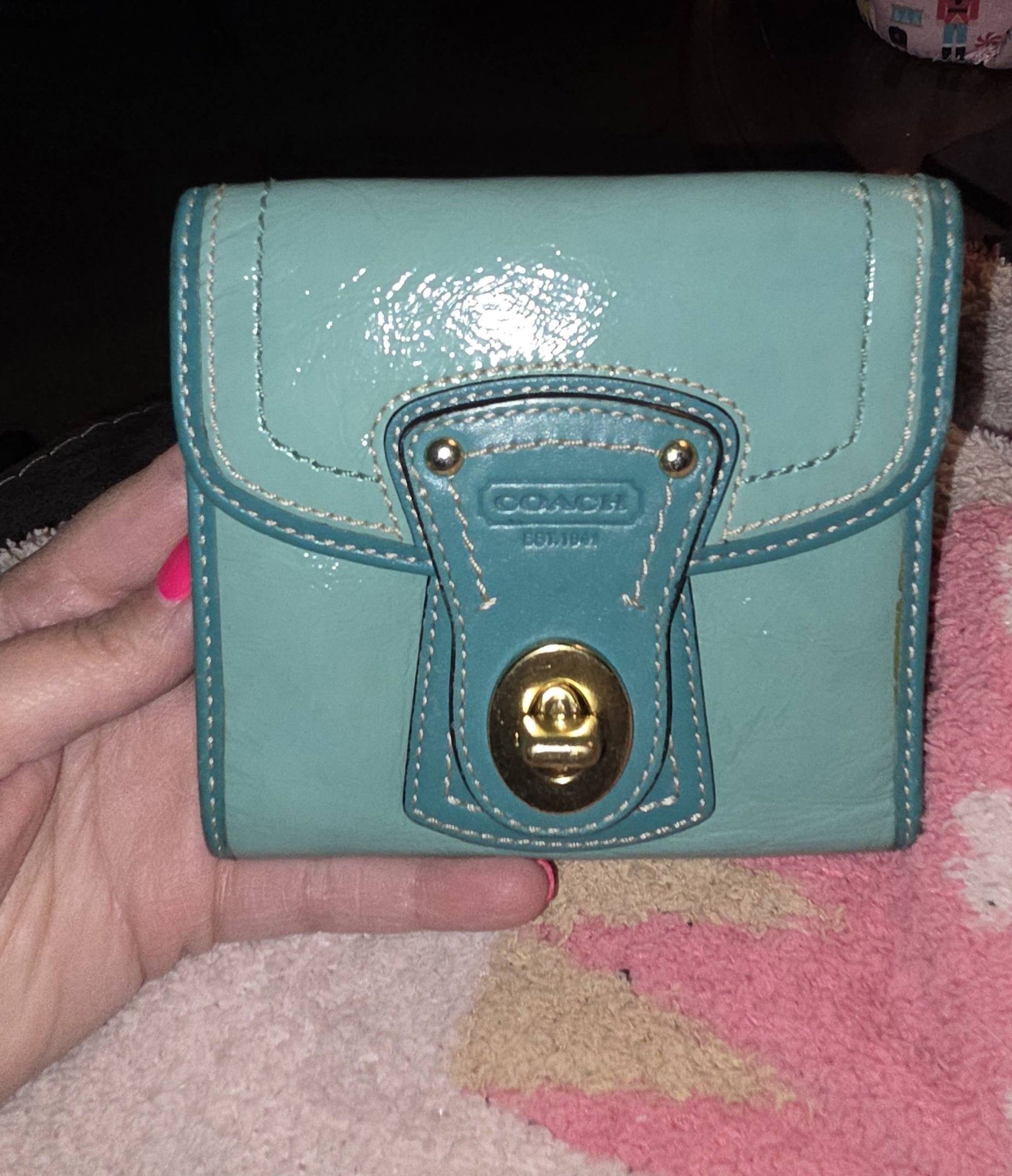 Turquoise Coach 65th anniversary turnlock wallet for sale
