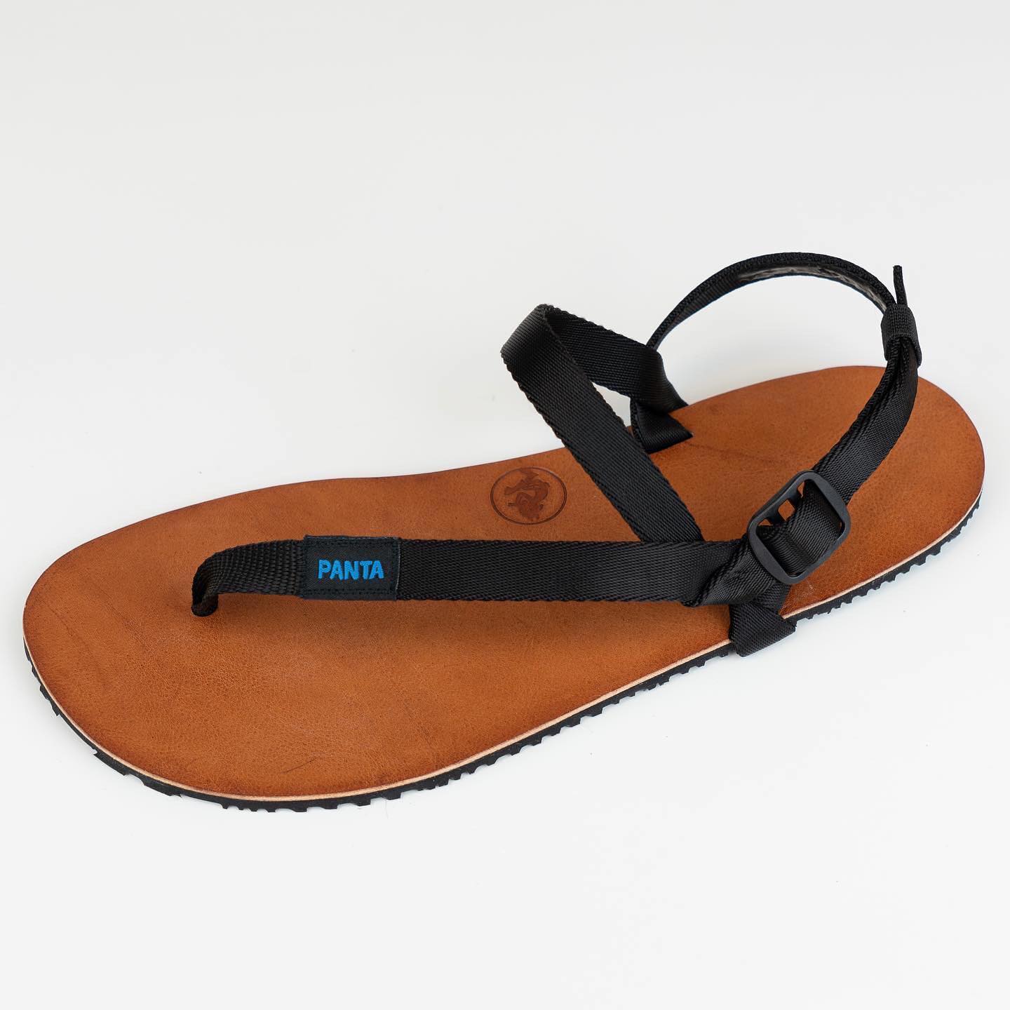 Lykaios chestnut brown sandals are now part of the permanent 