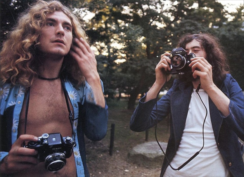 Jimmy Page taking a picture of Robert Plant during their 1971 tour