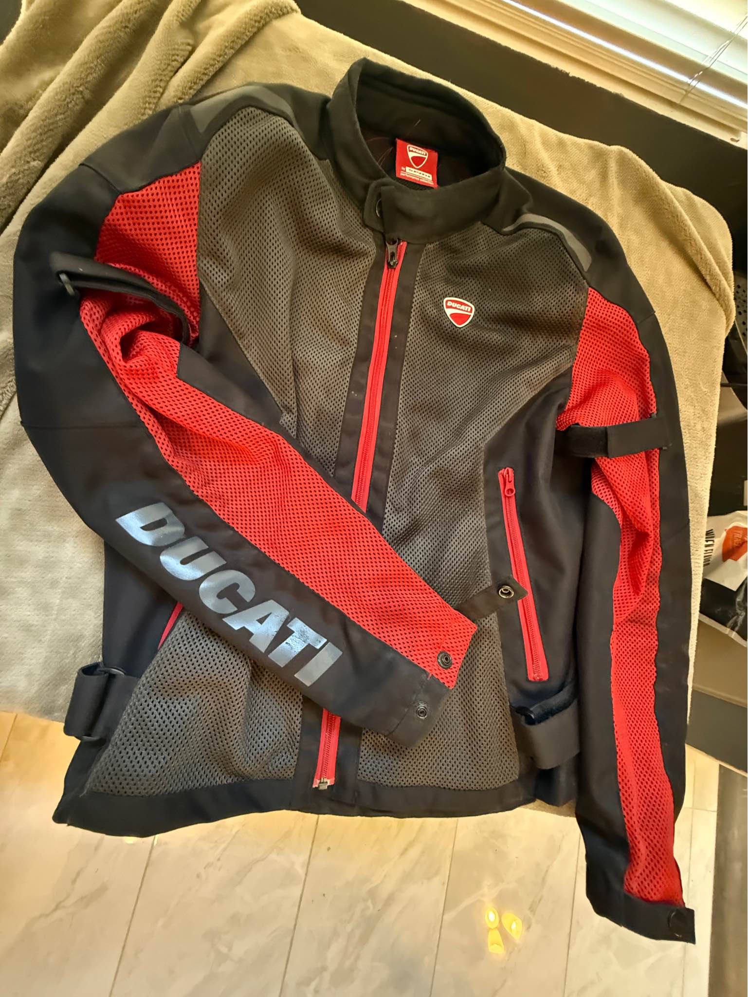 Ducati textile jacket made by Spidi. Comes with the Spidi back 
