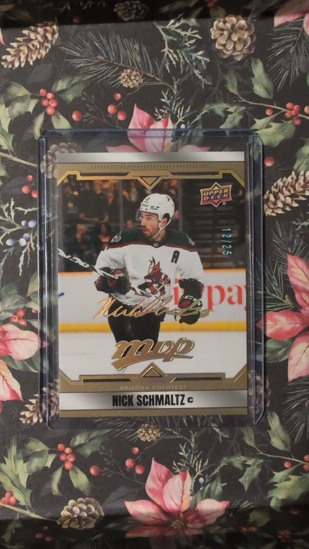 What is the value of a Nick Schmaltz MVP Super Script 12/25 hockey 