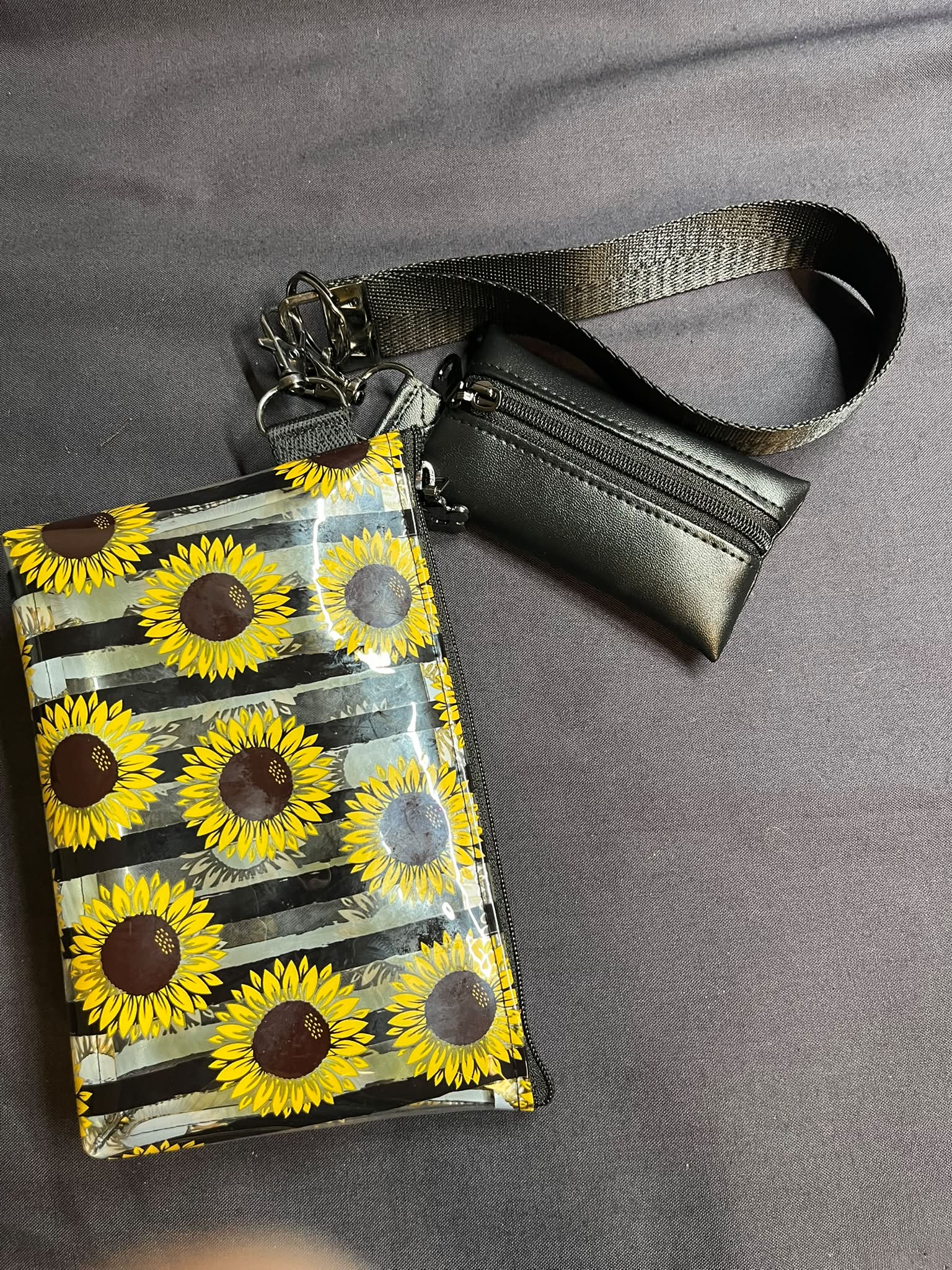 Adorable clear vinyl sunflower wristlet with lip gloss holder. The