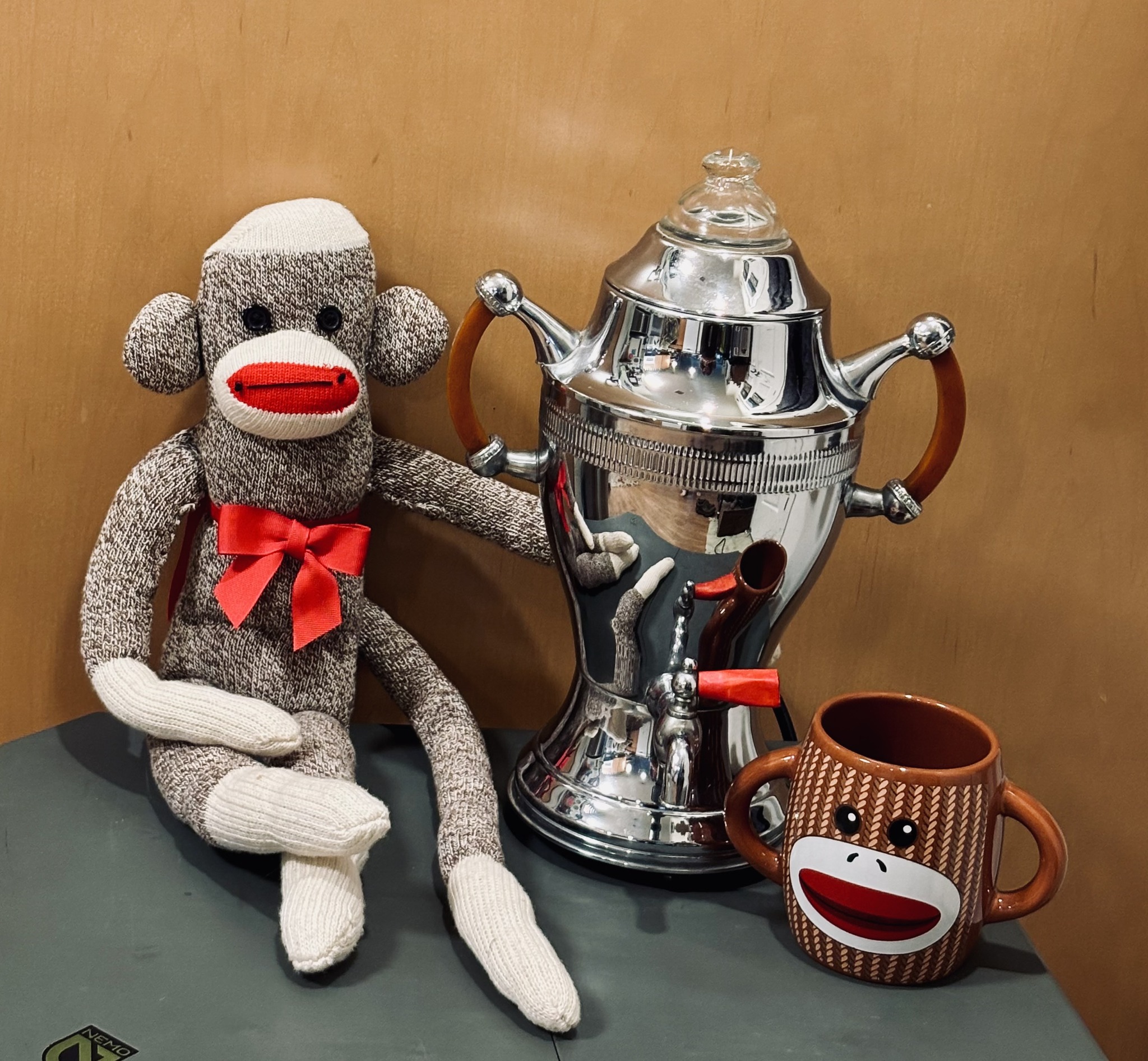 Vintage percolator with sock monkey theme