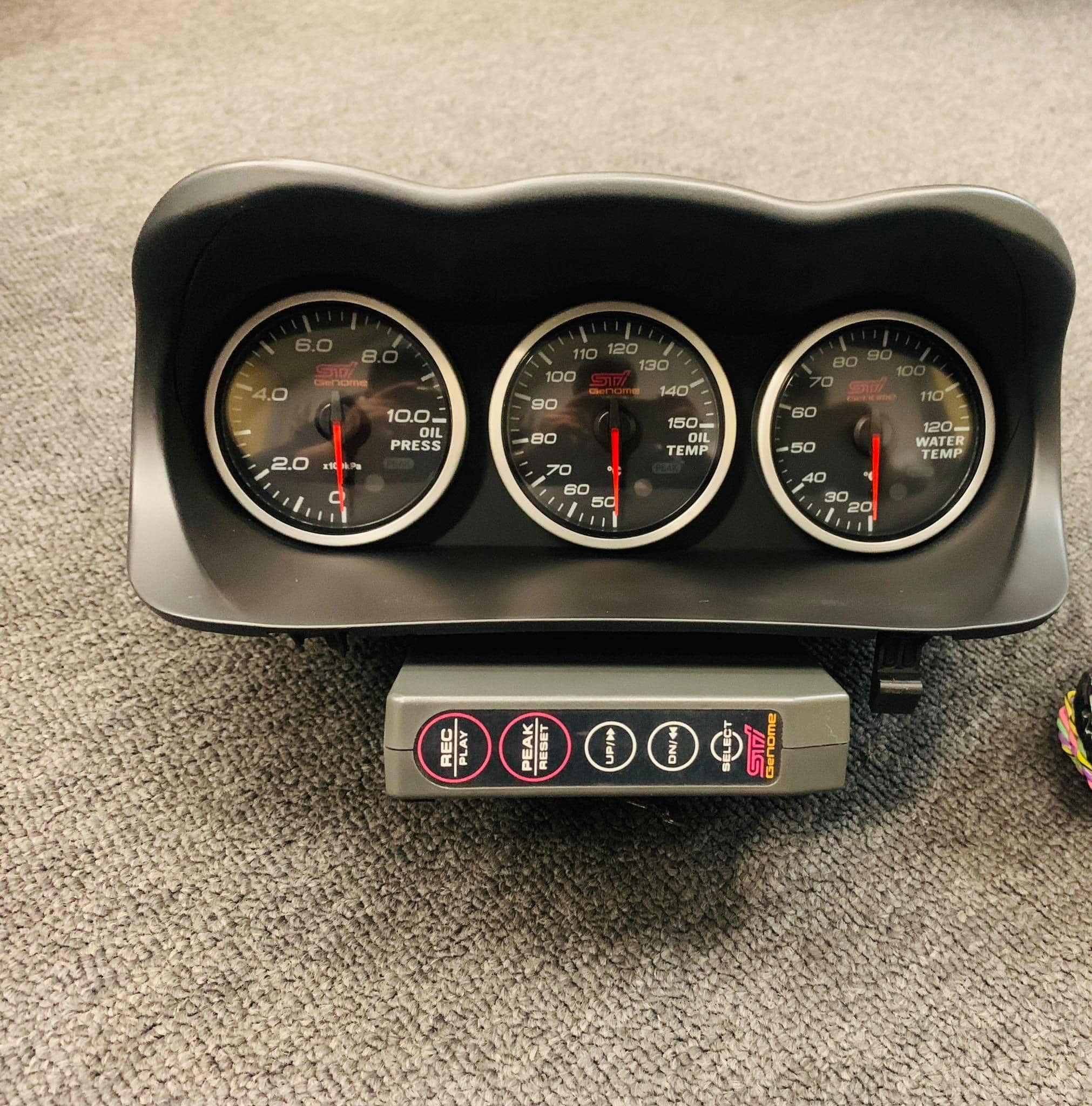 I am using a 2006 WRX STI with an STI Genome gauge installed, but
