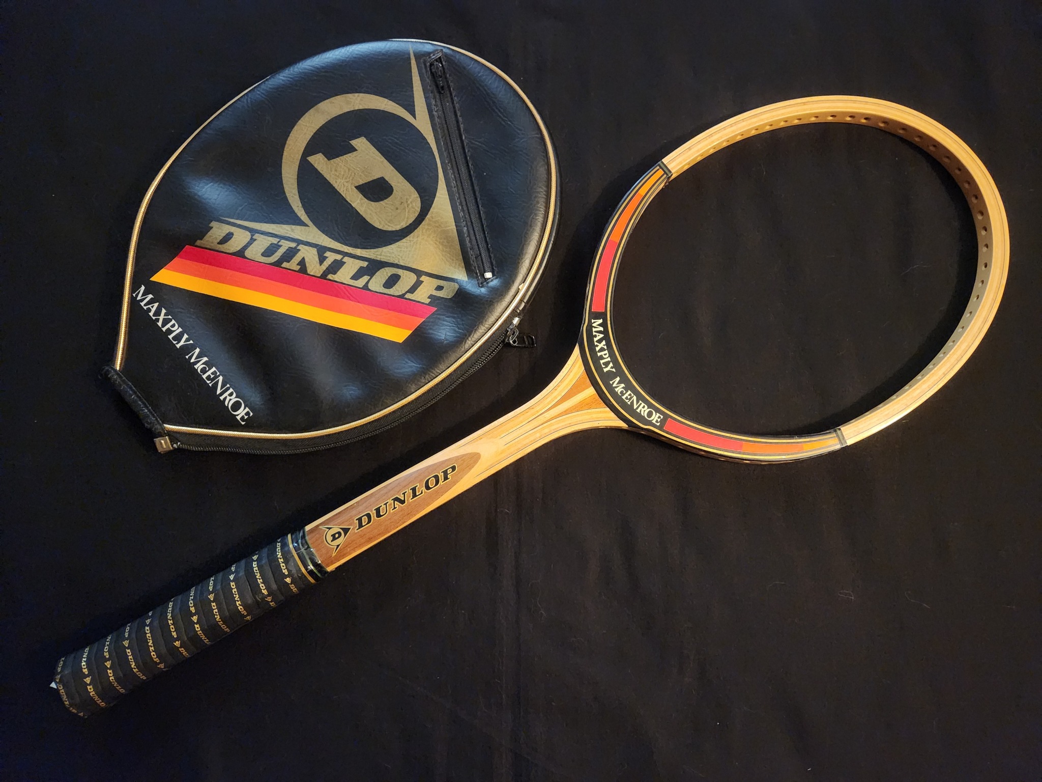 A Dunlop Maxply McEnroe with custom cover