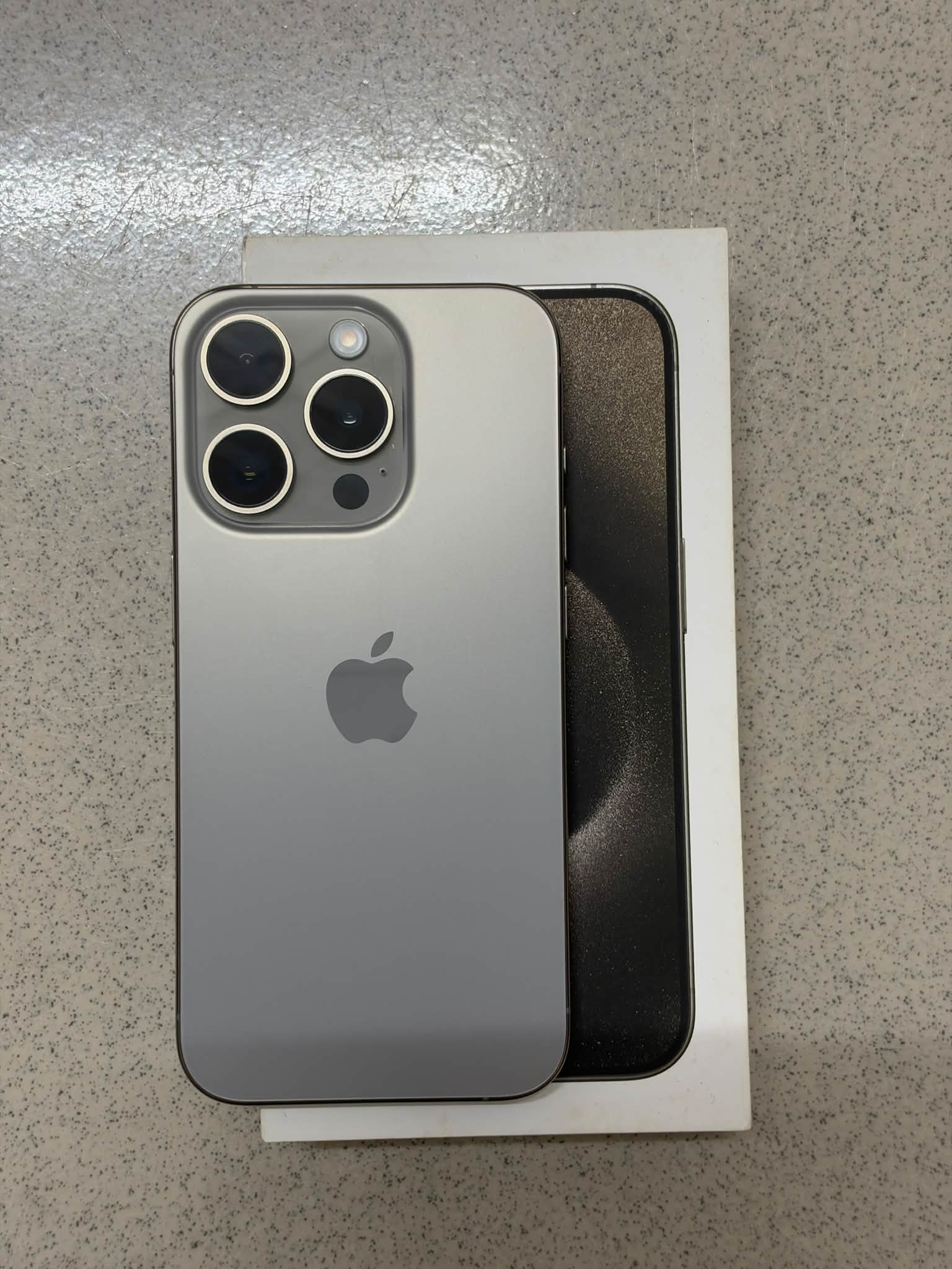 iPhone 15 Pro for sale in Natural Titanium with 256gb storage and