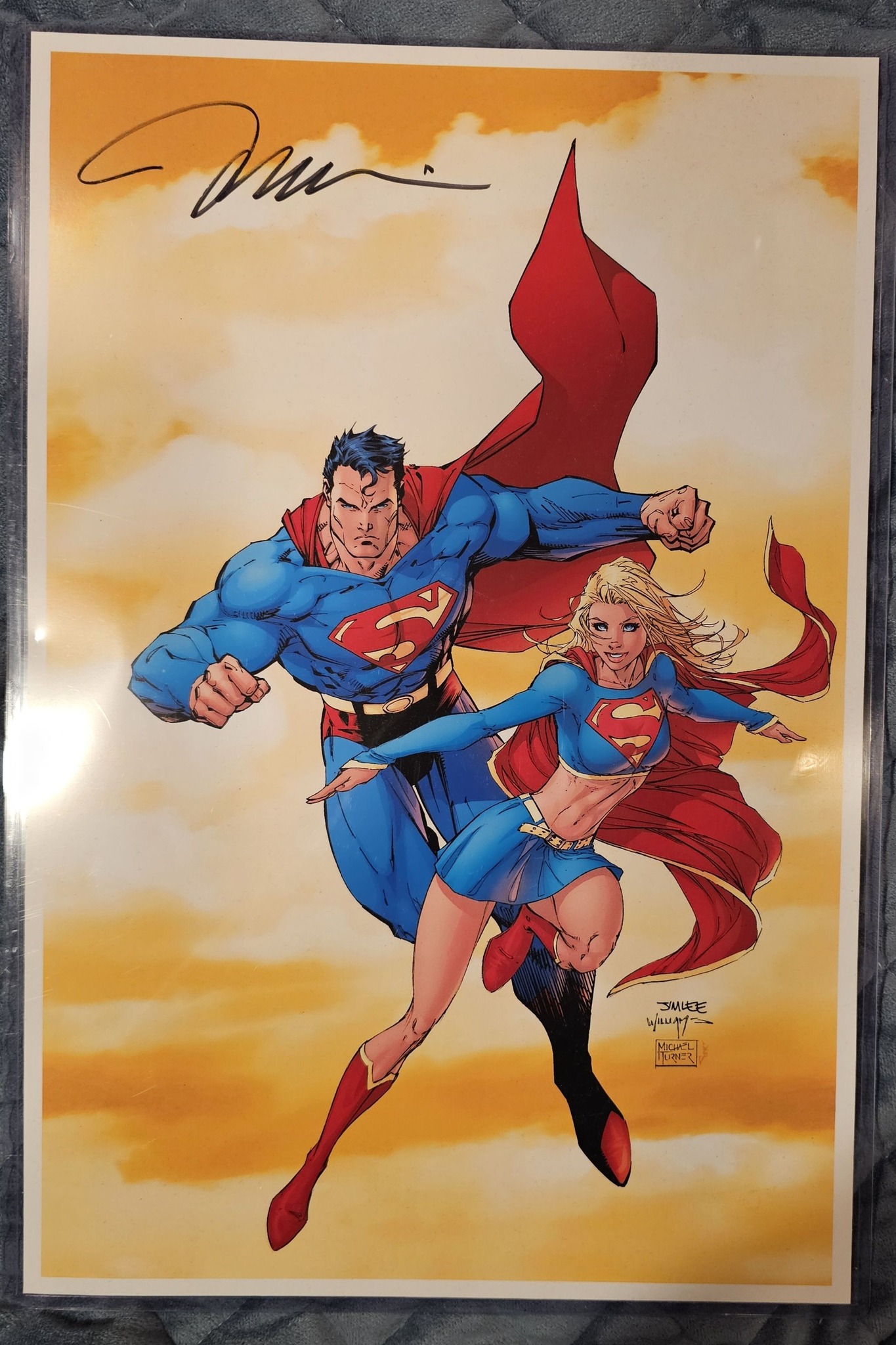 Signed Superman and Supergirl art by Jim Lee from NYCC