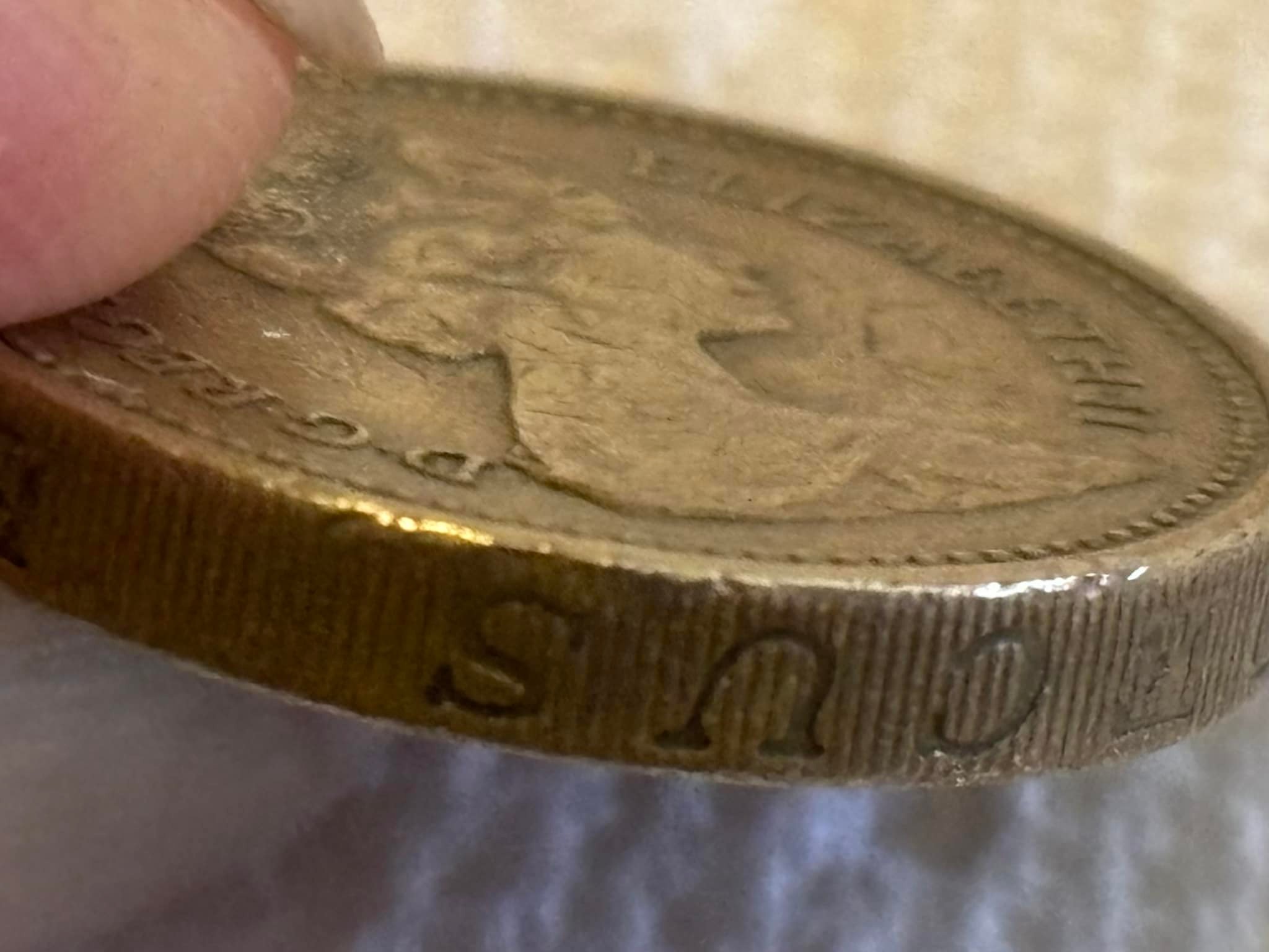 Is this 1983 error coin with upside down Queen Elizabeth II