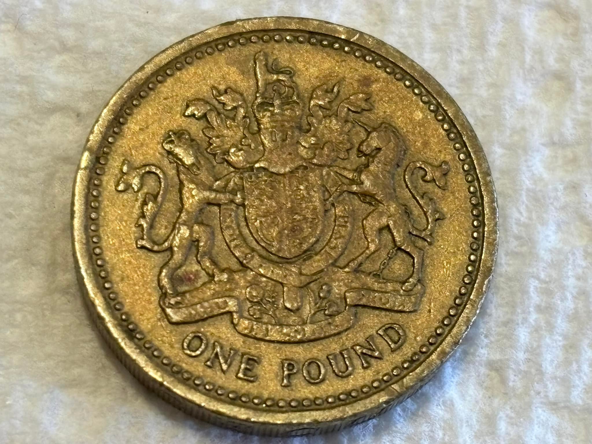 Is this 1983 error coin with upside down Queen Elizabeth II
