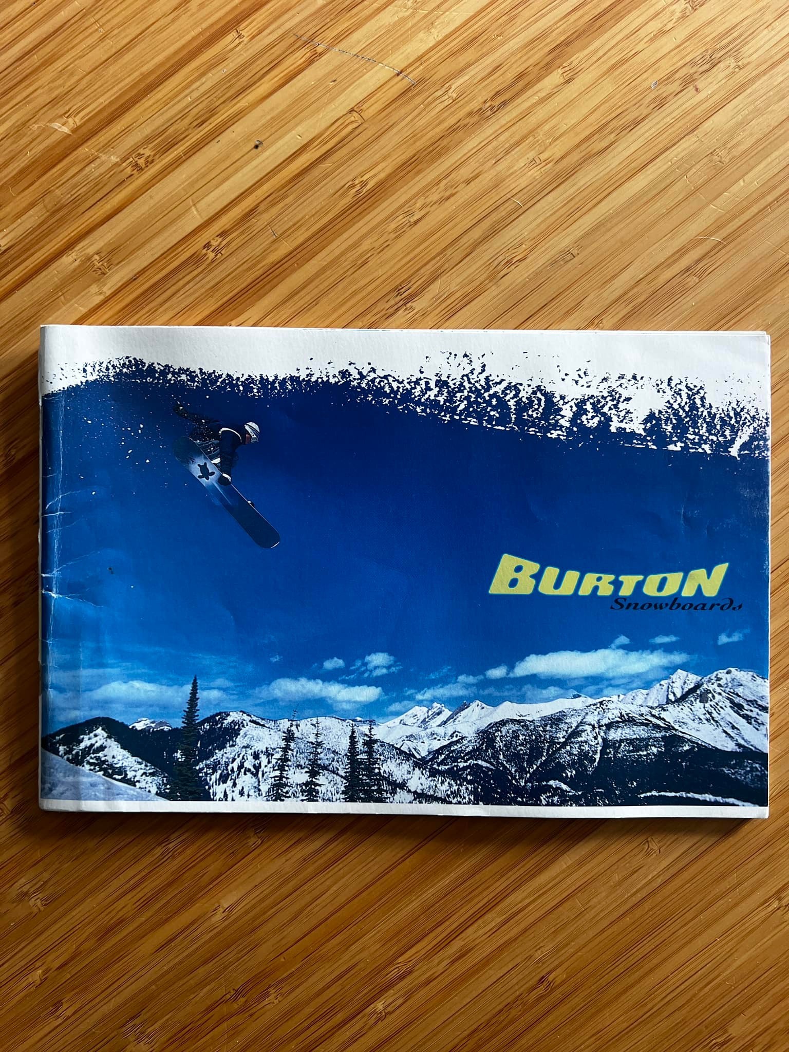 Vintage Burton snowboard catalogs and gear collection
