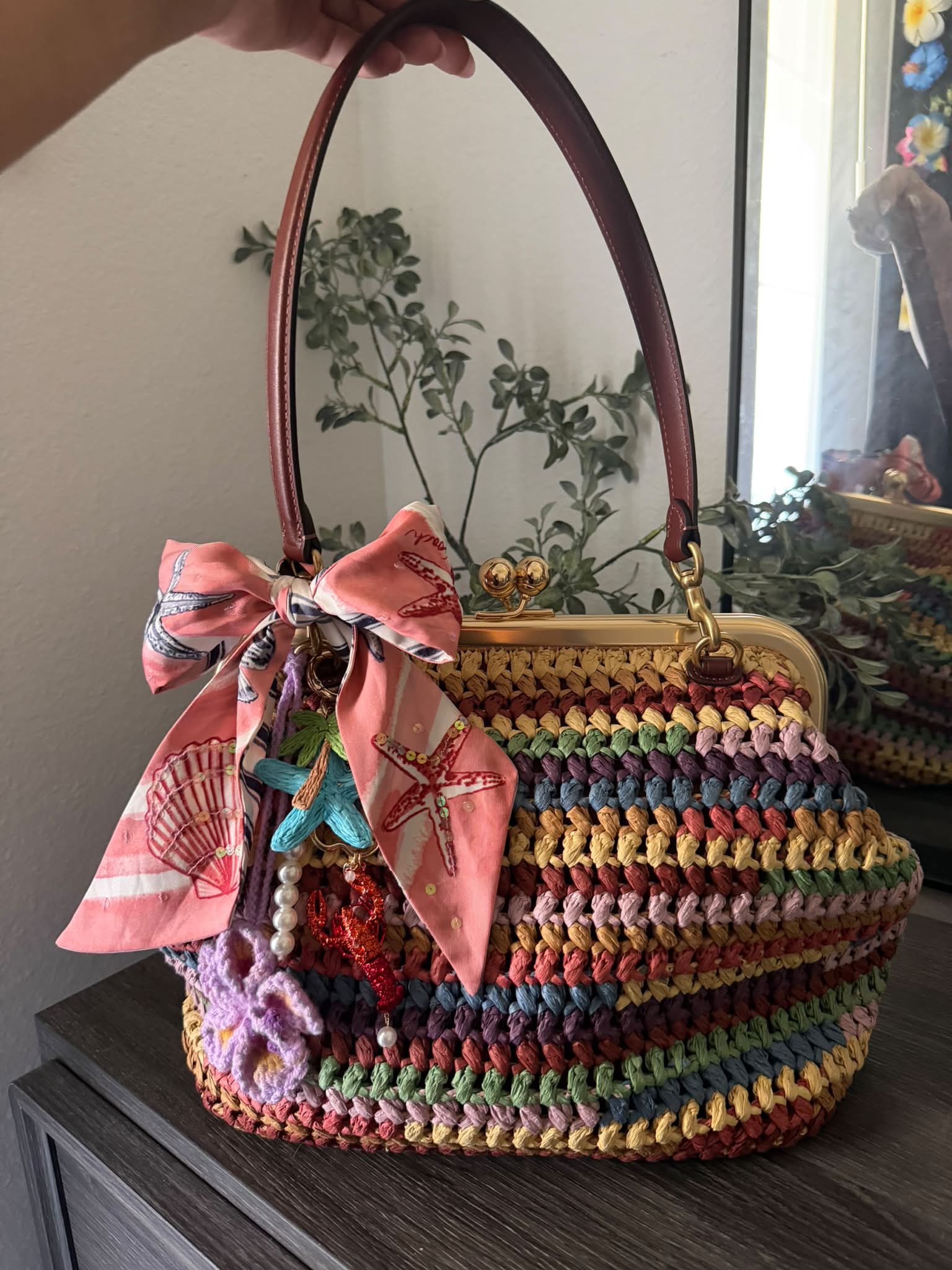 Her first day out ✨👜🌾🌈 coach straw kisslock ! I love it so much