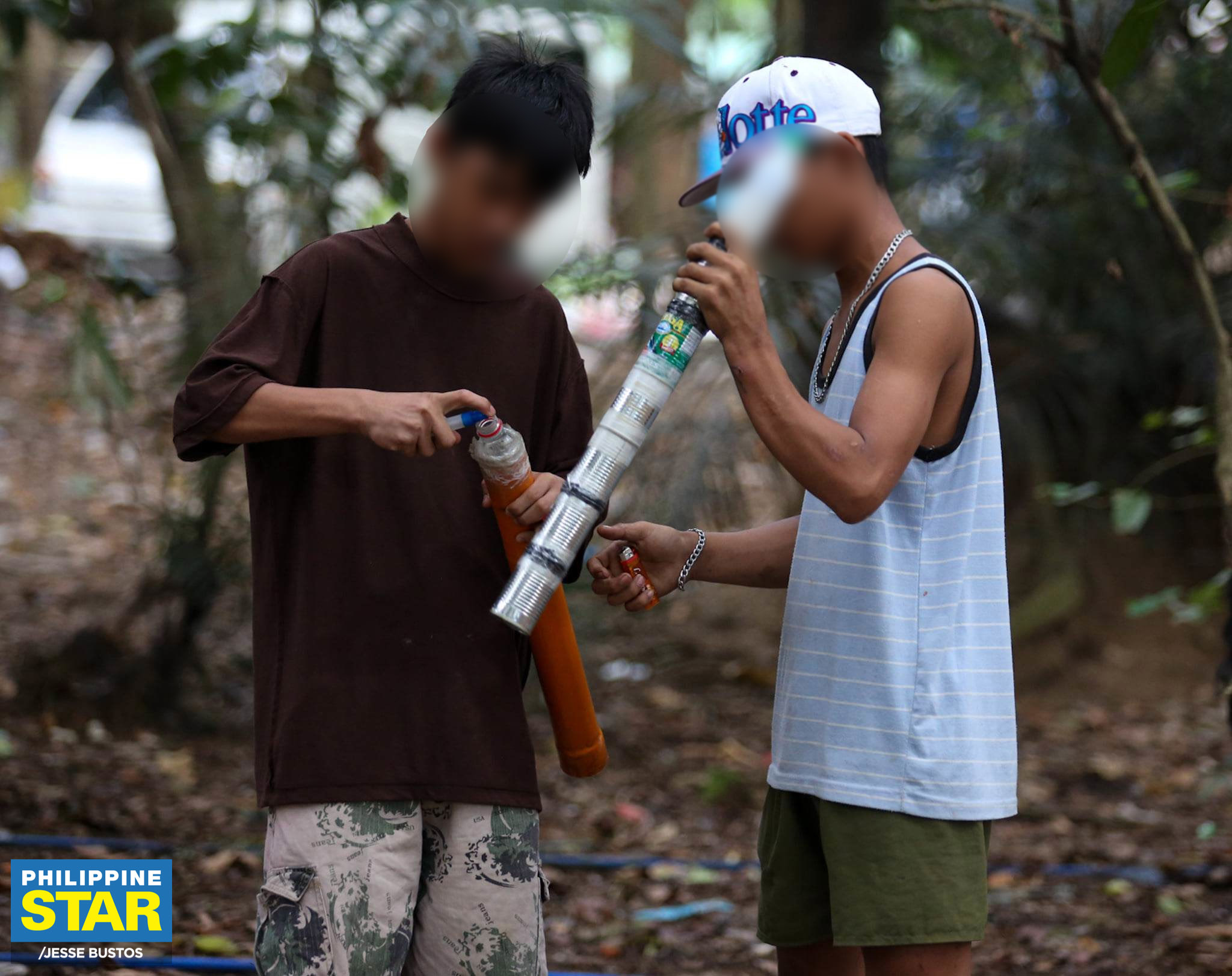 Philippine Star - Teenagers are seen firing boga in Barangay Culiat ...