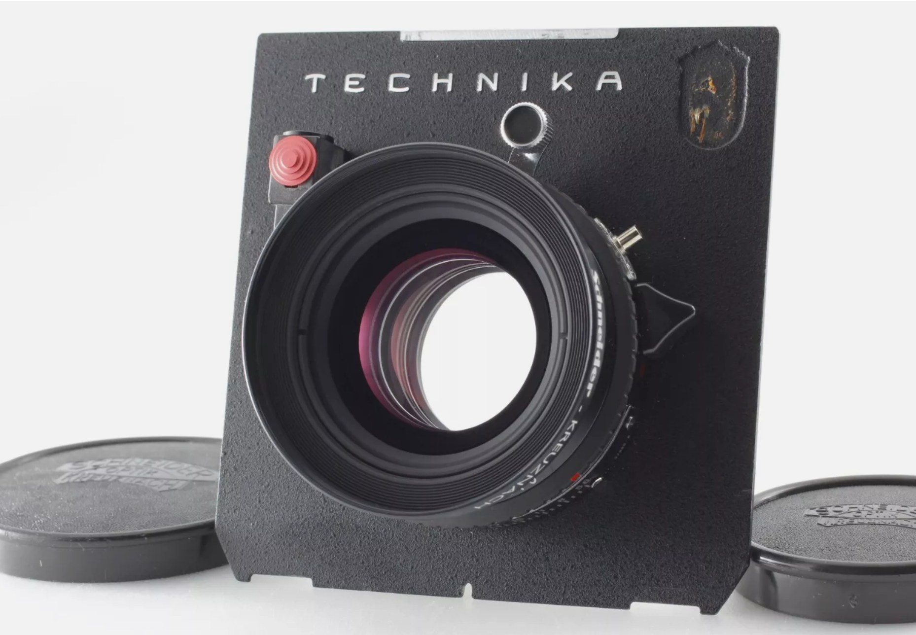Can Linhof Schneider Symmar 210mm f5.6 lens fit inside Technika V