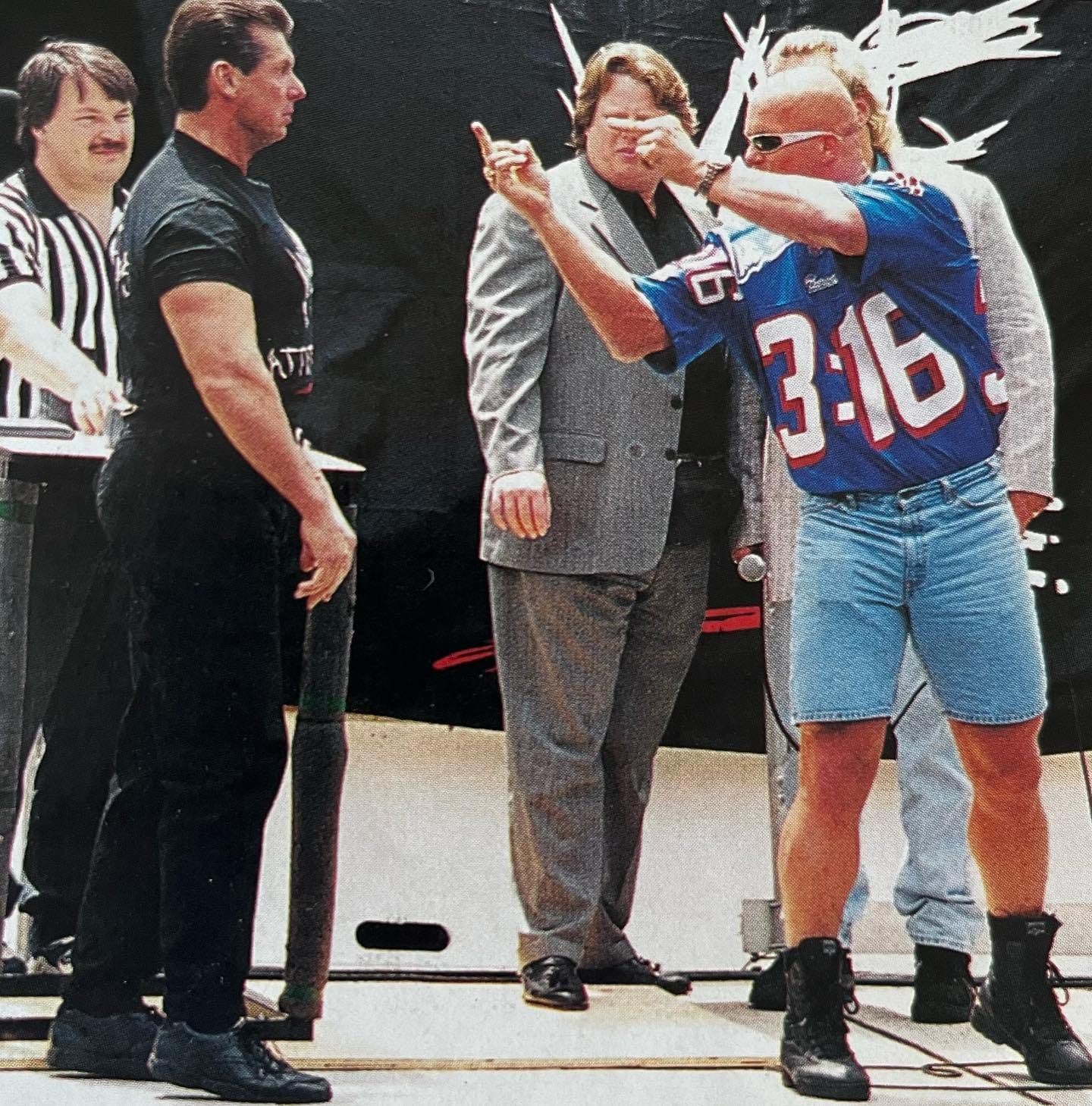 Stone Cold Steve Austin and Vince McMahon's iconic handshake at