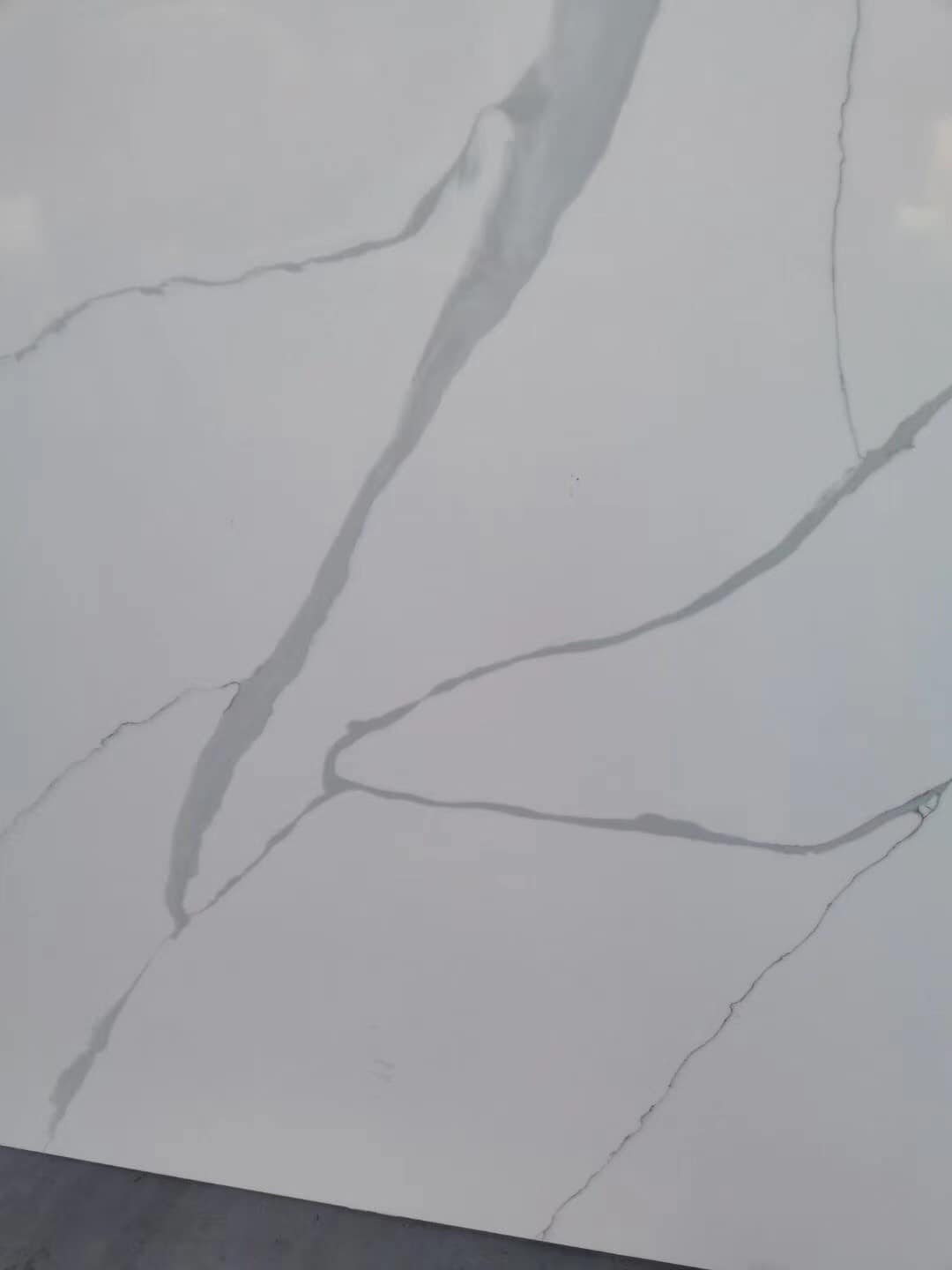 Bysson Stone - Bysson Stone New Calacatta Quartz Slabs... | Facebook