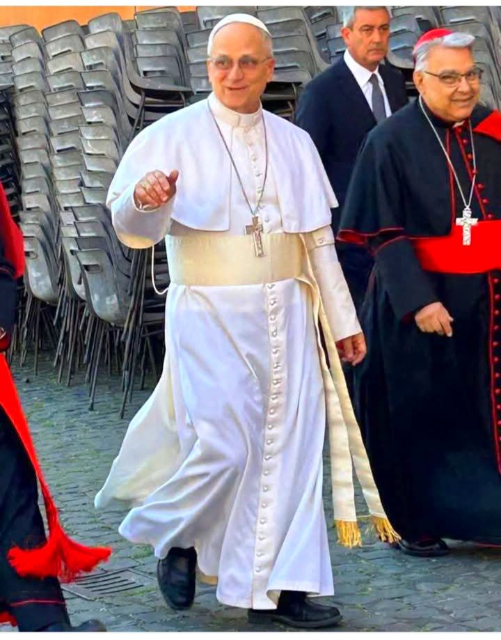 The young priest in this photo never imagined the Vatican would