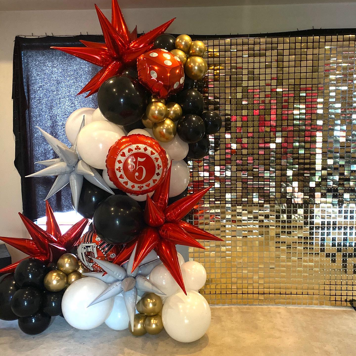 Balloon Elegance - Casino themed garland and shimmer backdrop ...