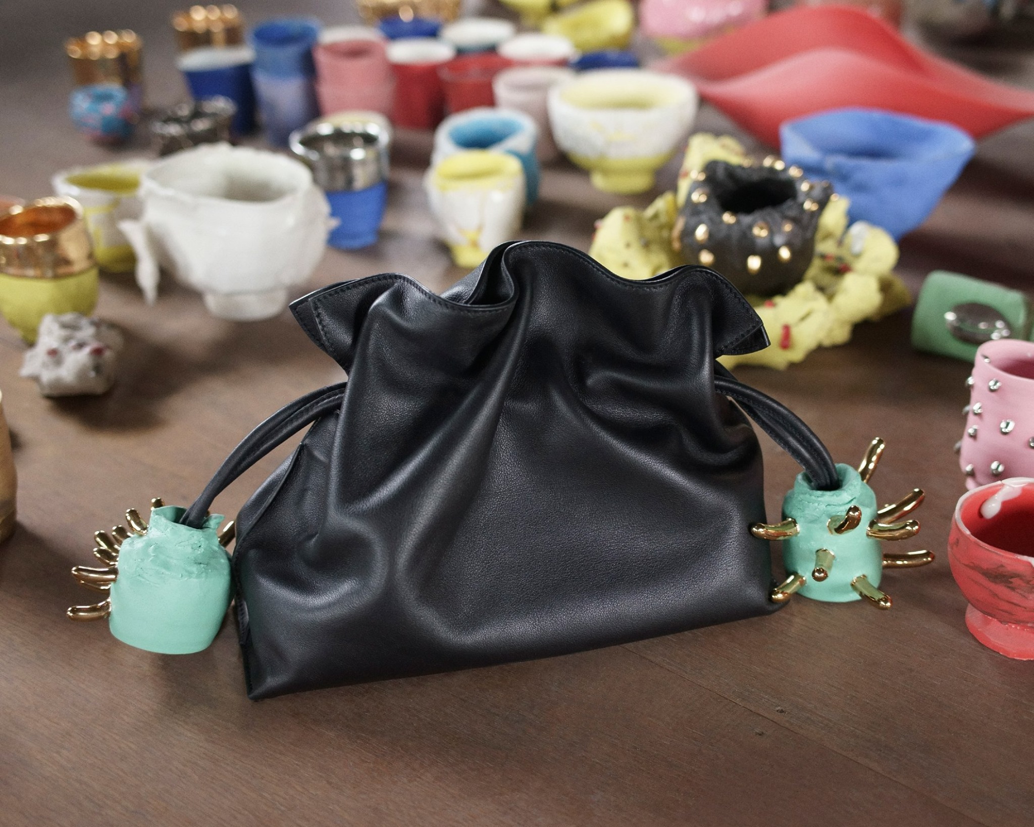 For the #LOEWEFW20 Womenswear show, Takuro Kuwata's ceramic pieces