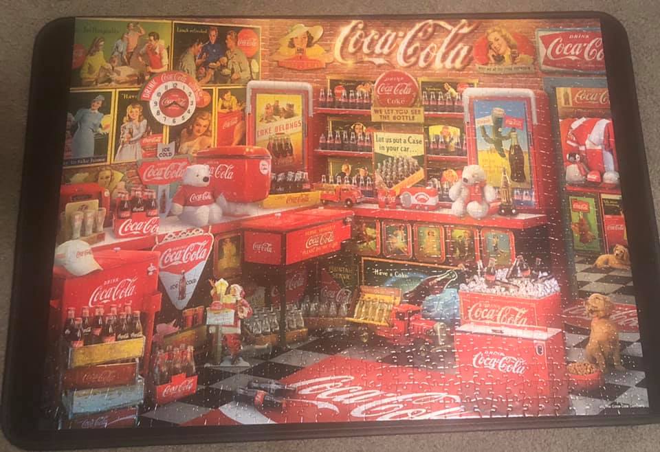 It was a Coca-Cola picture it's a puzzle that s That my aunt put