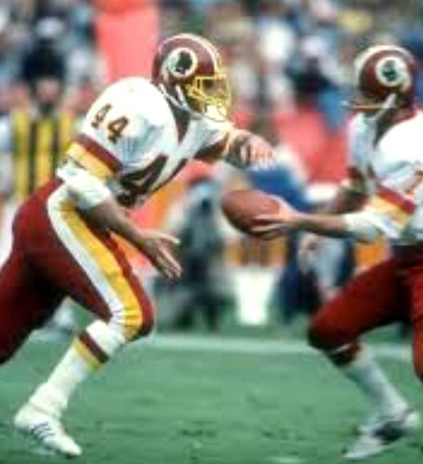 Riggins and Joe Theismann. | Facebook