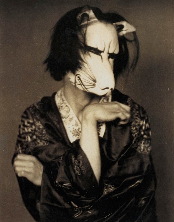 Alvin Langdon Coburn.The dancer Michio Ito wearing a mask designed