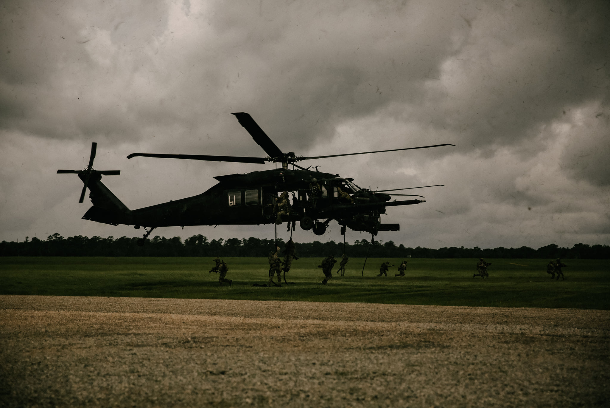 Modern - US Army Rangers from the 75th Ranger Regiment fast rope form a ...