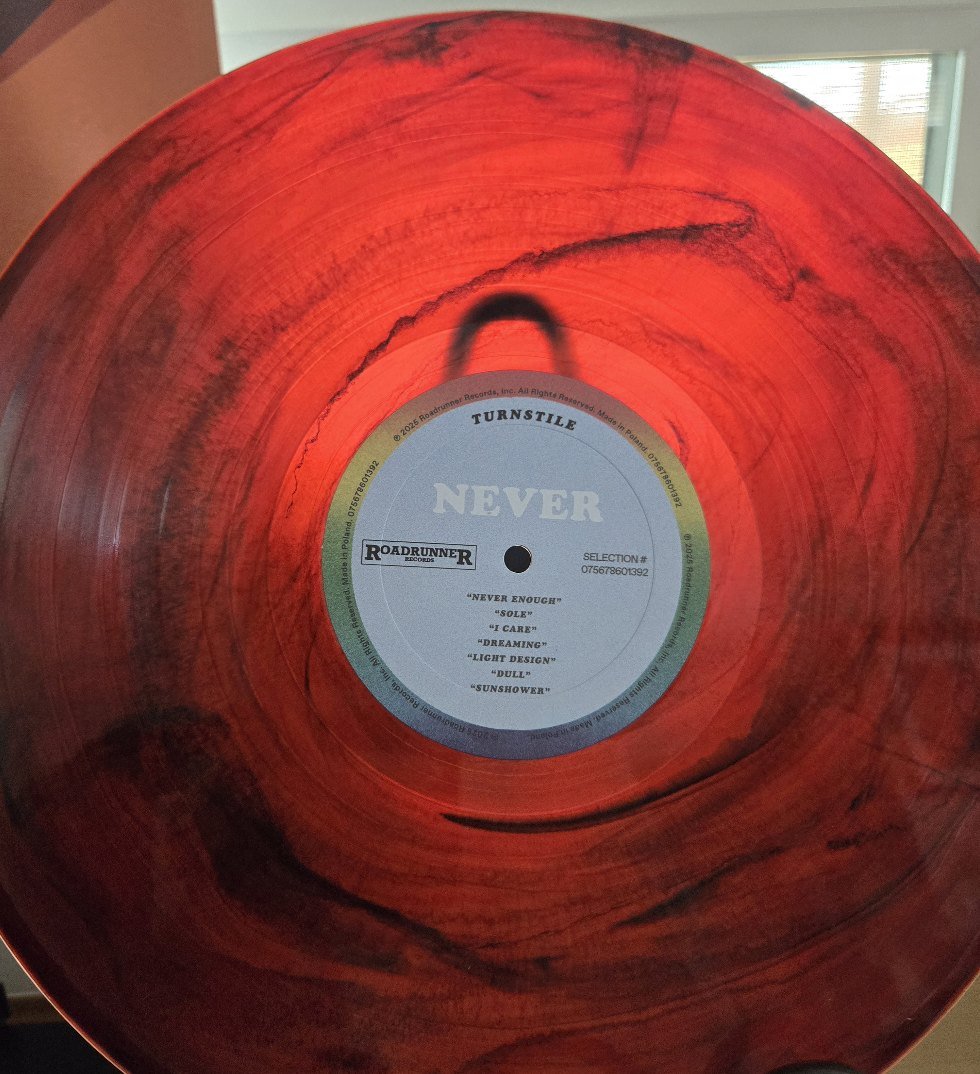 Turnstile's Never Enough album on red wave colored vinyl