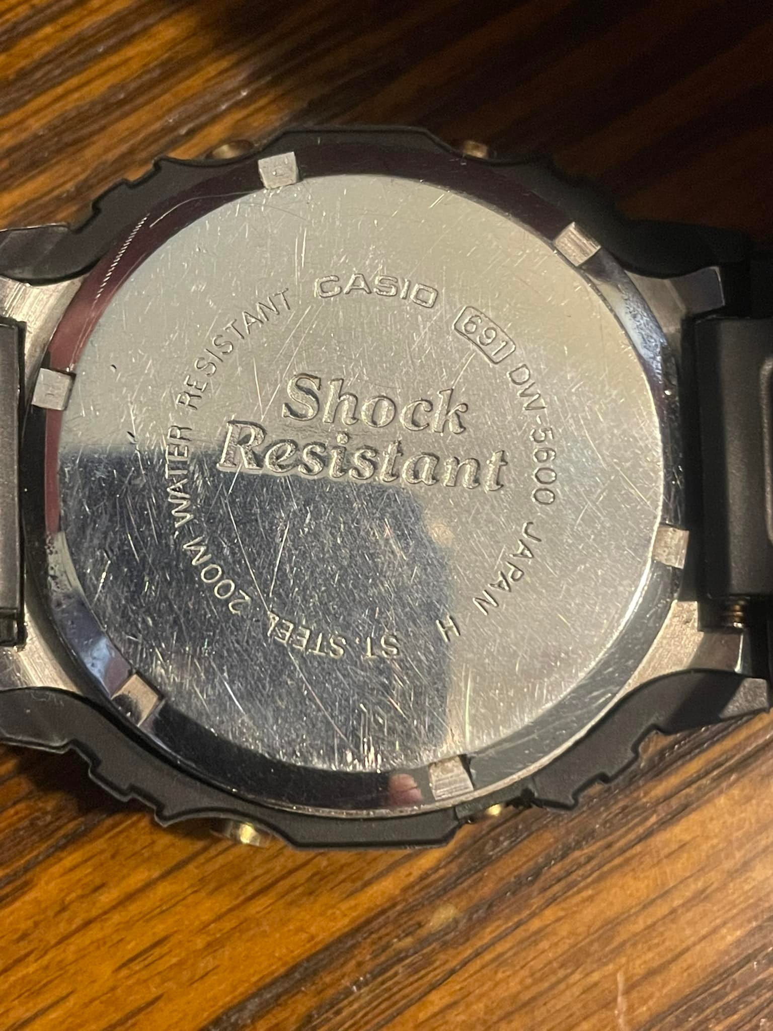 DW-5600C-9V watch with replaced strap and bezel