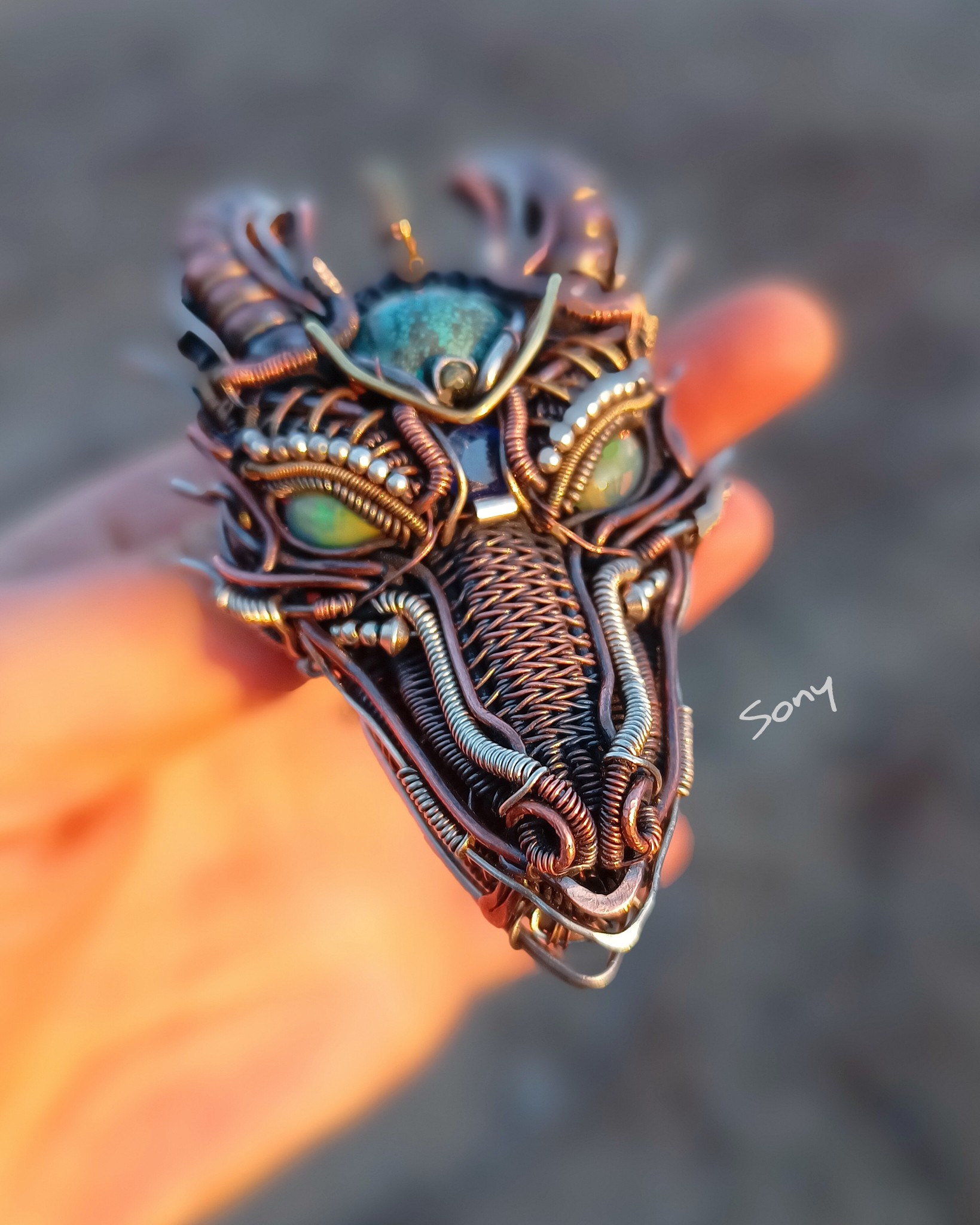Articulated dragon head in turquoise and sterling silver