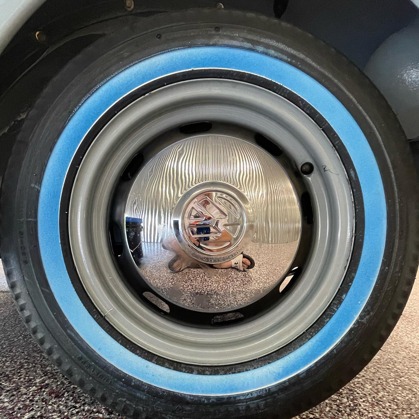 New white wheels installed on vintage Volkswagen